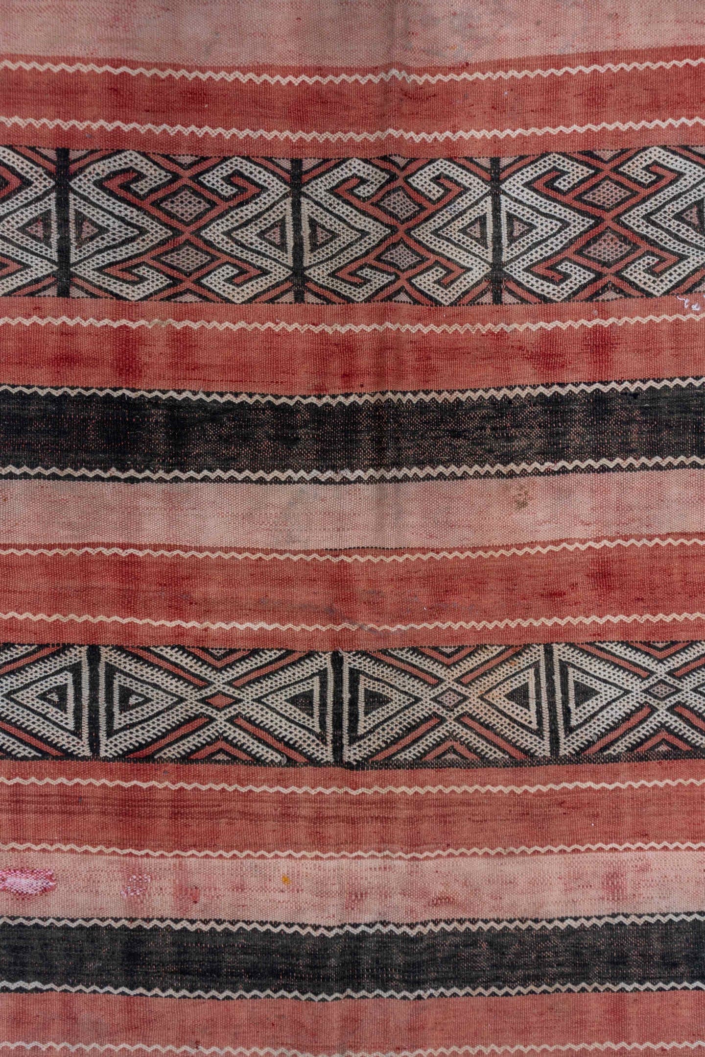 5' x 8' one-of-a-kind handmade vintage Jijim medium size rug. Color palette: rose, blush, charcoal, ivory, dusty pink, pink