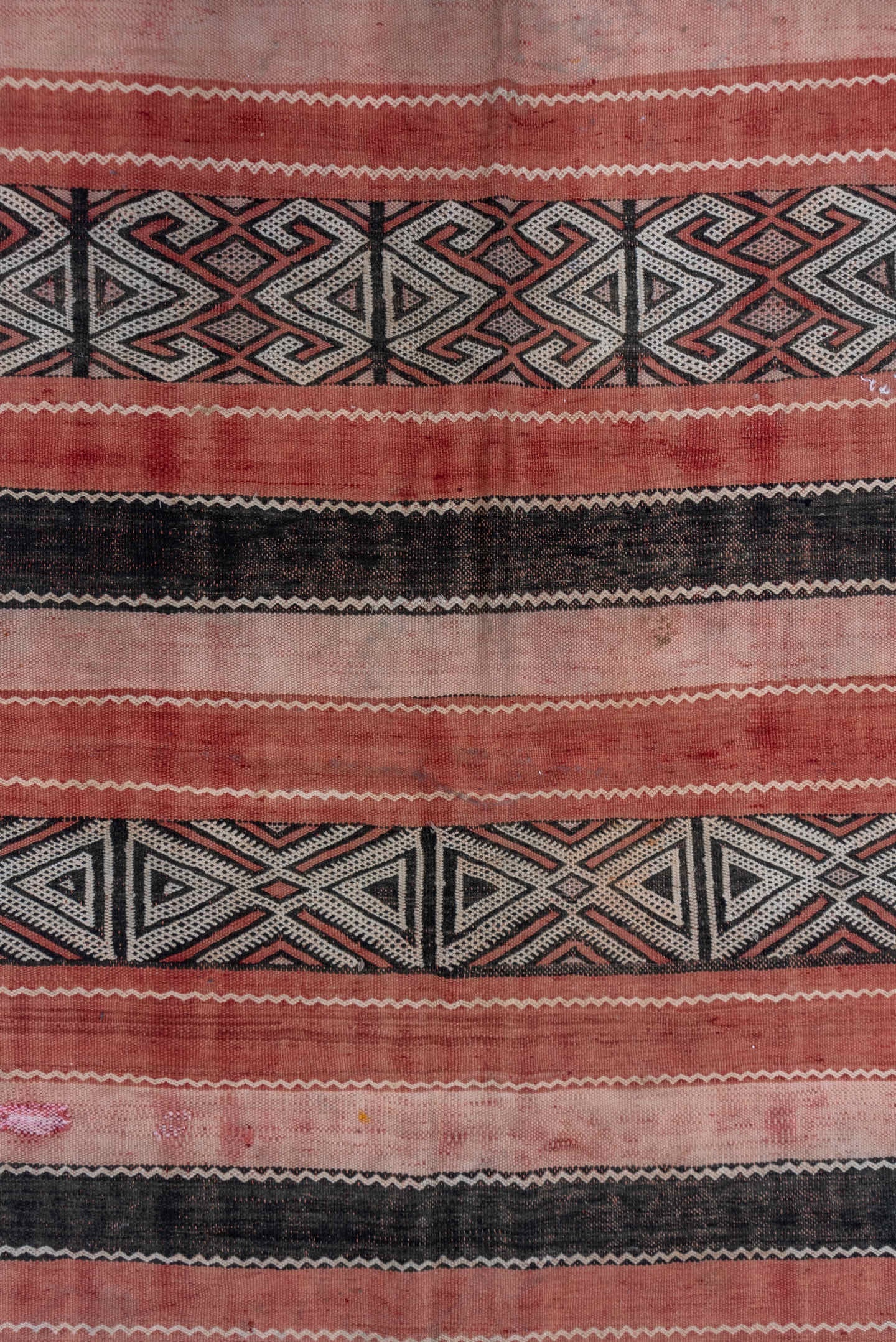 5' x 8' one-of-a-kind handmade vintage Jijim medium size rug. Color palette: rose, blush, charcoal, ivory, dusty pink, pink