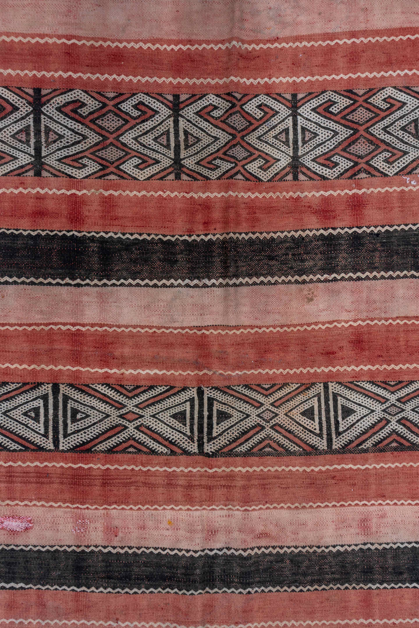 5' x 8' one-of-a-kind handmade vintage Jijim medium size rug. Color palette: rose, blush, charcoal, ivory, dusty pink, pink