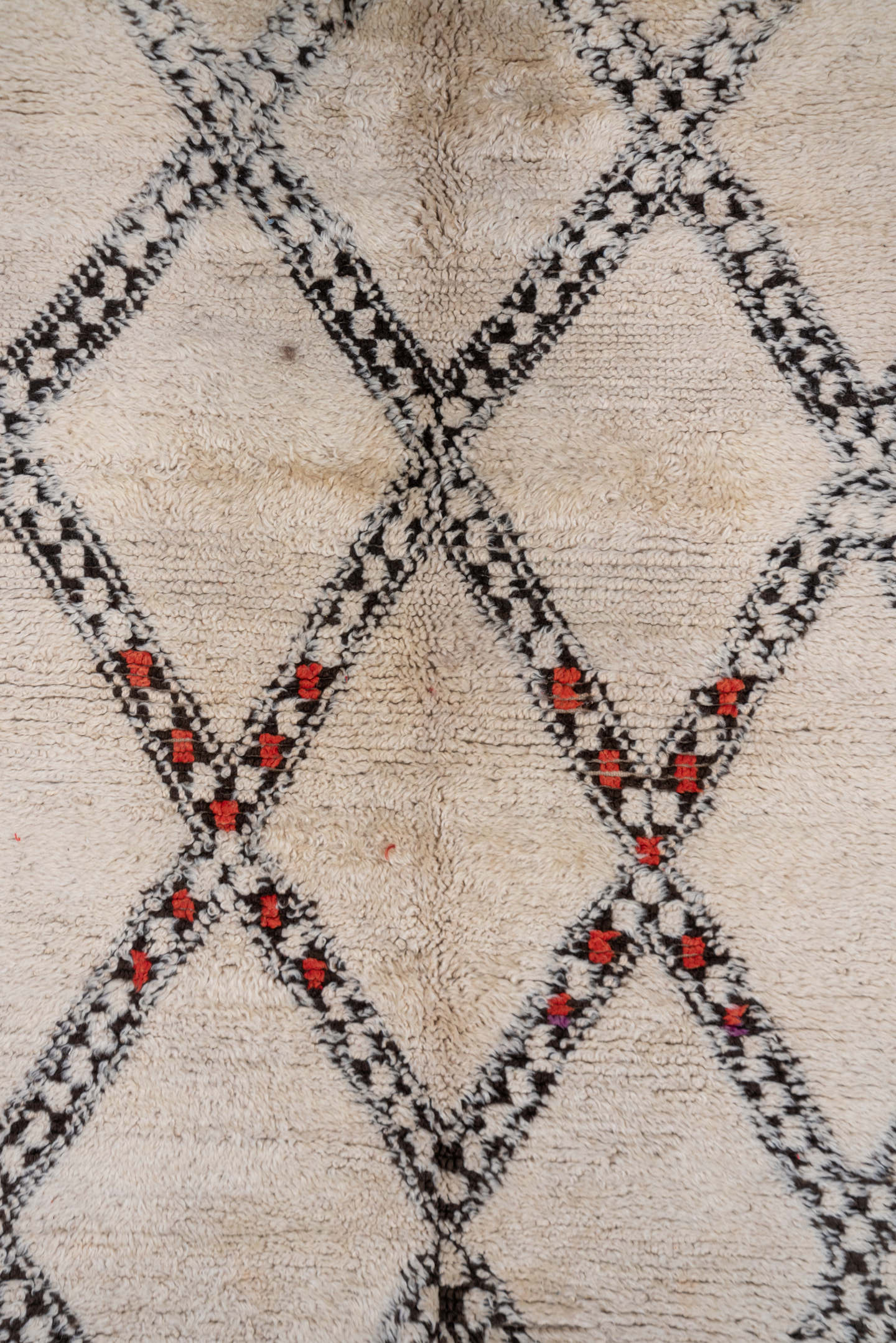 5' x 11' one-of-a-kind handmade vintage Moroccan rug. Color palette: ivory, charcoal, cream, red, gray, black