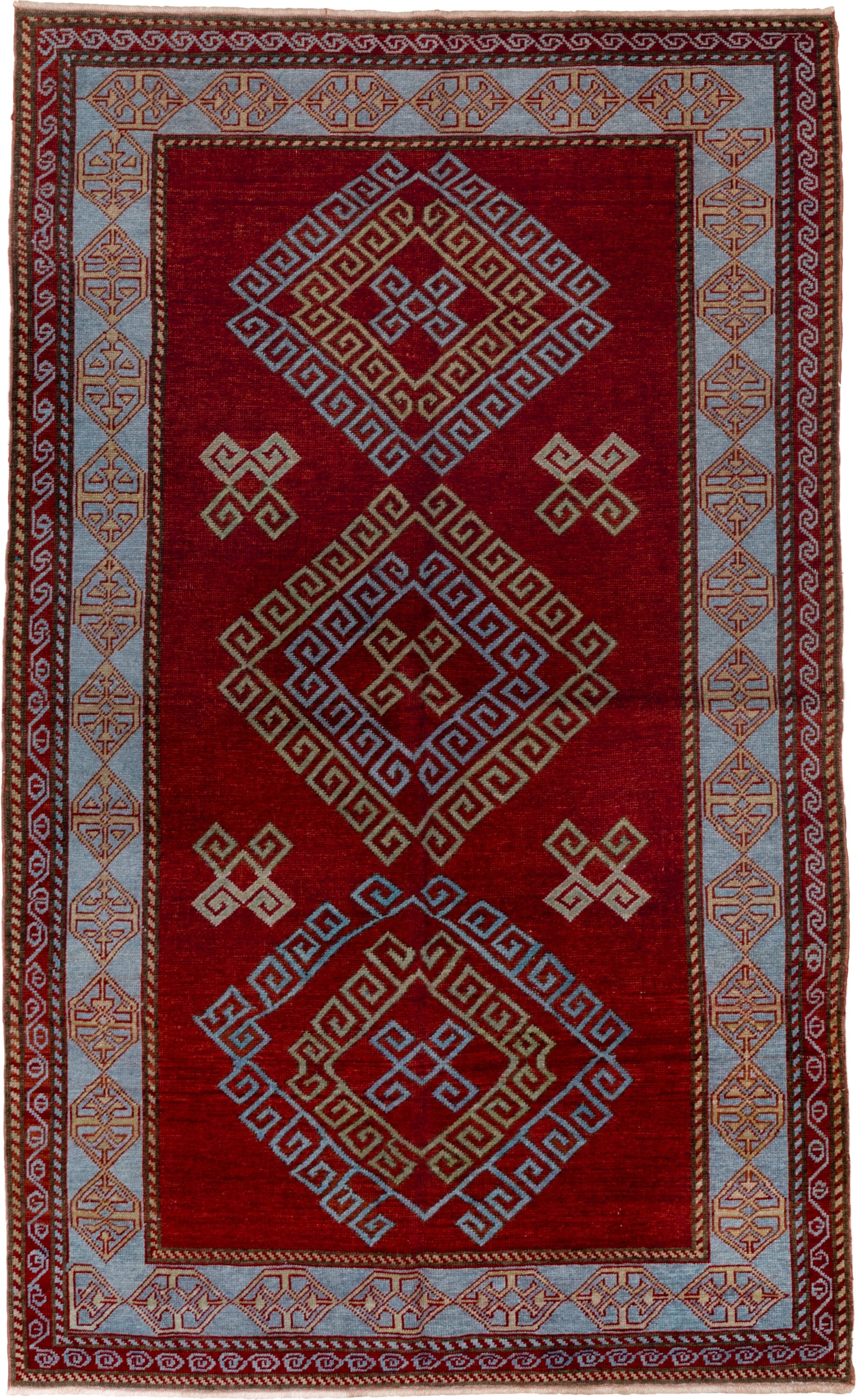 4' x 6' one-of-a-kind handmade vintage Caucasian small size rug. Color palette: red, ivory, sky blue, rust, burgundy, camel