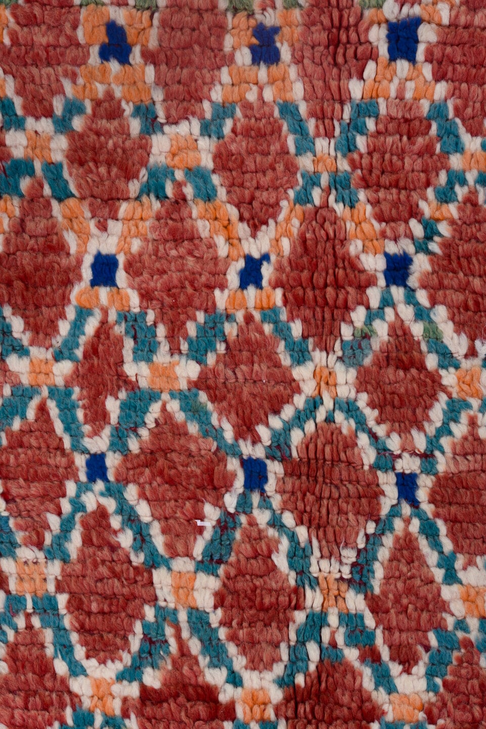 4' x 11' one-of-a-kind handmade antique Moroccan runner rug. Color palette: red, ivory, blue, coral, green, rose, terracotta