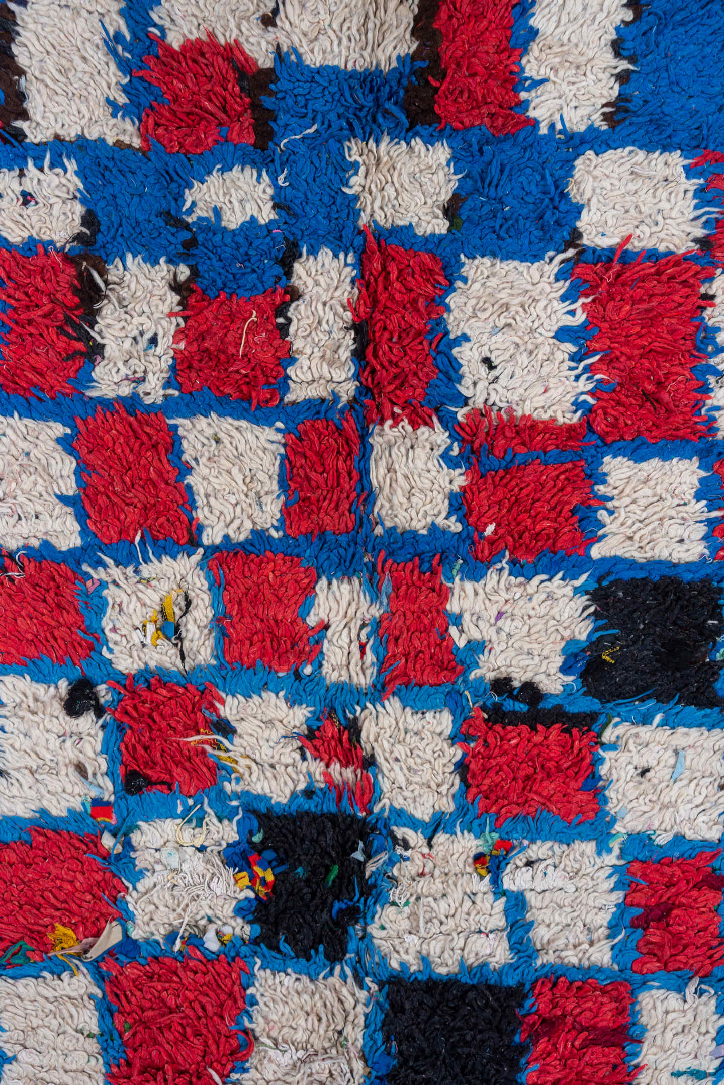 4' x 10' one-of-a-kind handmade vintage Moroccan runner rug. Color palette: ivory, cobalt, crimson, black, blue, red