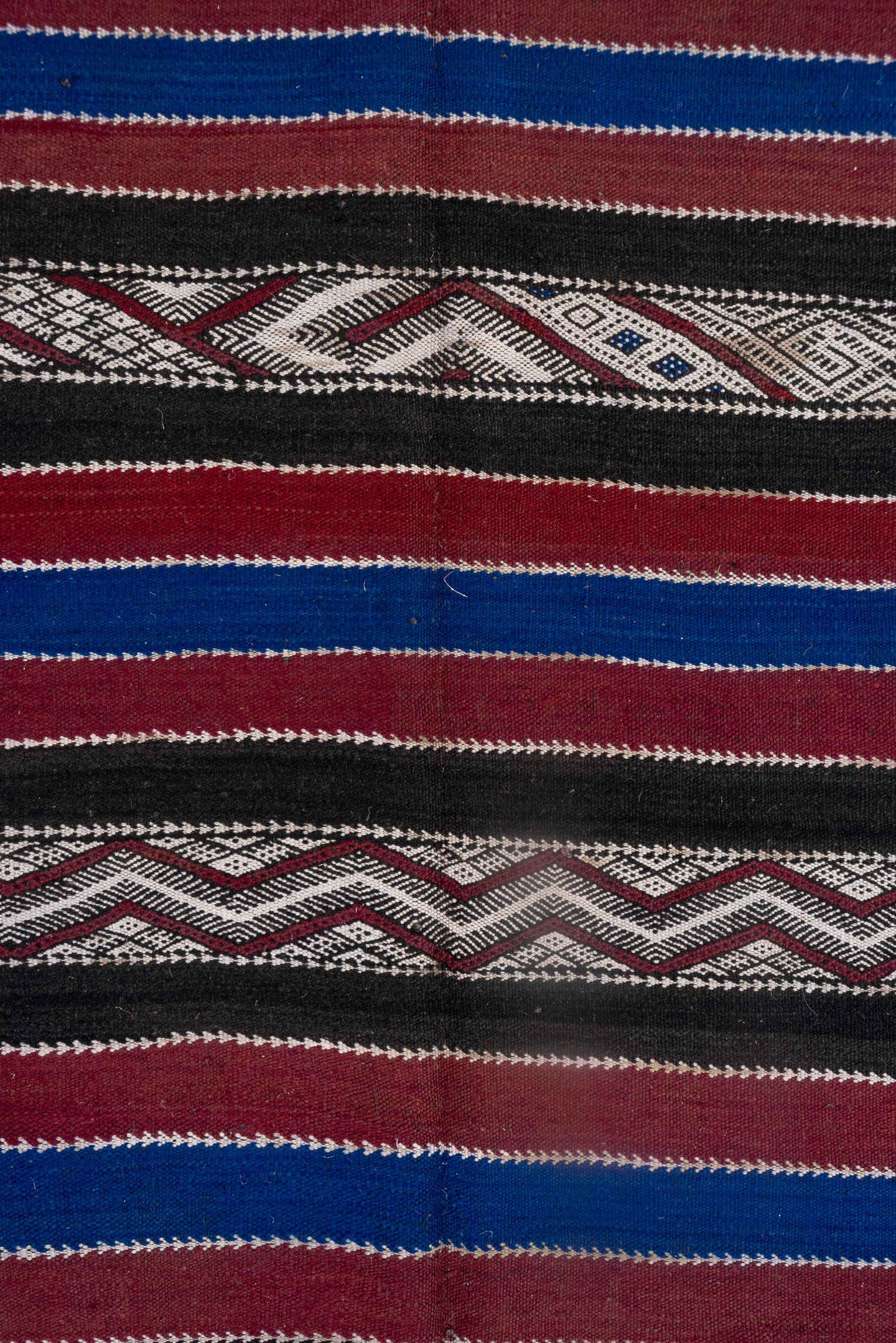 5' x 11' one-of-a-kind handmade vintage Kilim runner rug. Color palette: black, burgundy, indigo, ivory, gray, purple