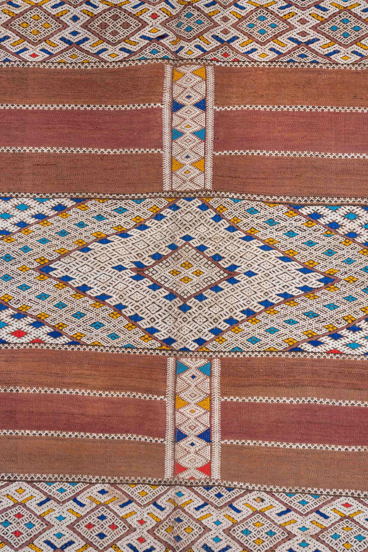 5' x 11' one-of-a-kind handmade vintage Kilim rug. Color palette: camel, ivory, indigo, rust, saffron, terra cotta, sky blue