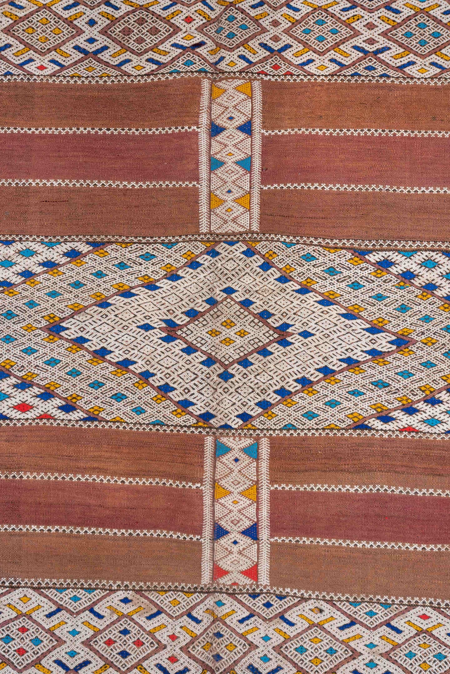 5' x 11' one-of-a-kind handmade vintage Kilim rug. Color palette: camel, ivory, indigo, rust, saffron, terra cotta, sky blue