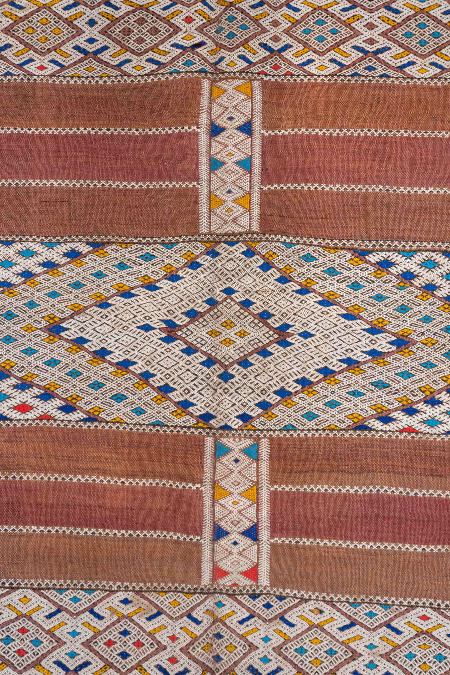 5' x 11' one-of-a-kind handmade vintage Kilim rug. Color palette: camel, ivory, indigo, rust, saffron, terra cotta, sky blue