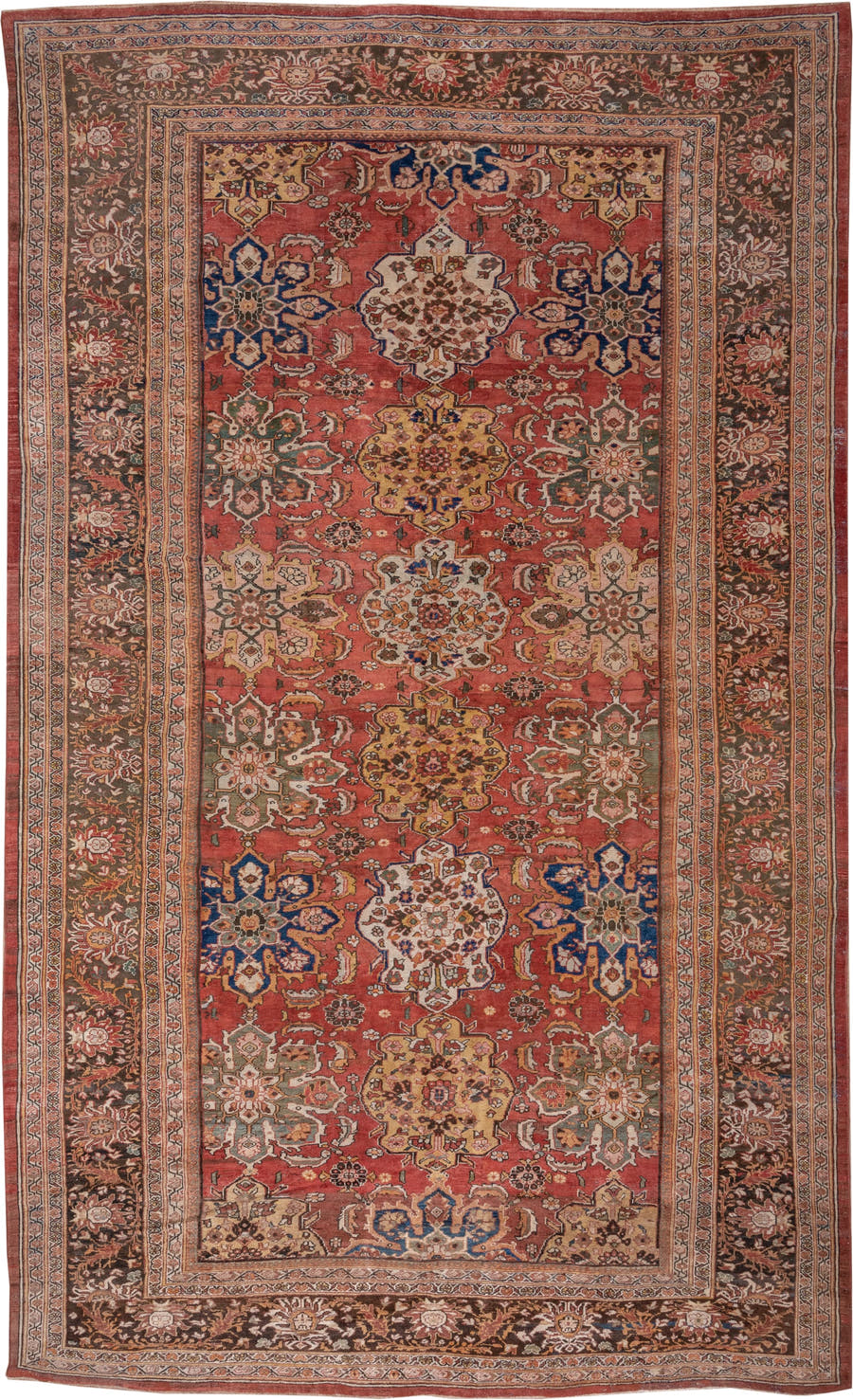 11' x 19' one-of-a-kind handmade antique Sultanabad oversize rug. Color palette: terra cotta, brown, ivory, gold, navy, sage