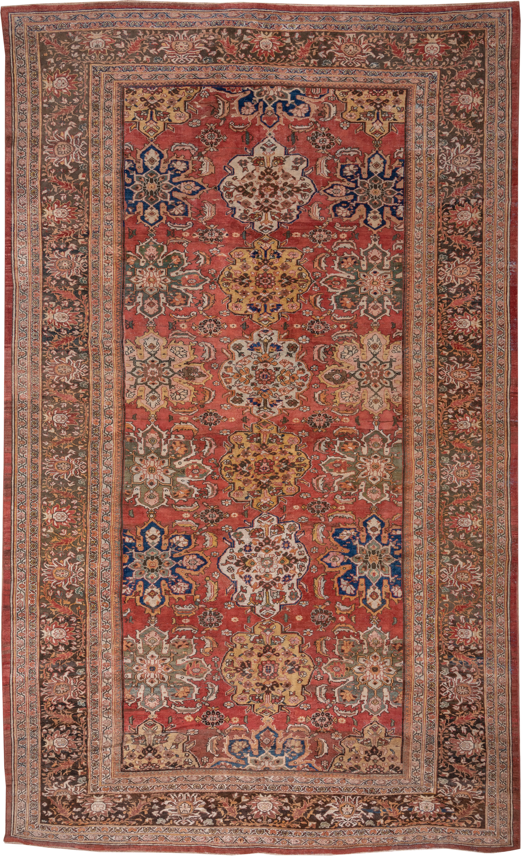 11' x 19' one-of-a-kind handmade antique Sultanabad oversize rug. Color palette: terra cotta, brown, ivory, gold, navy, sage