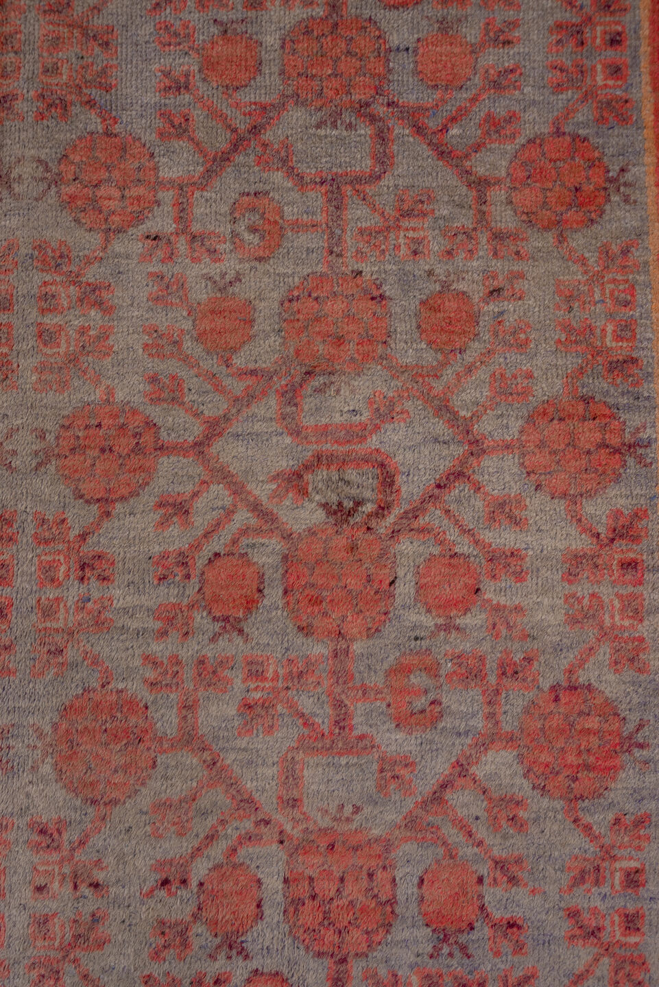 5' x 10' one-of-a-kind handmade vintage Khotan medium size rug. Color palette: rose, rust, taupe, terra cotta, dusty blue