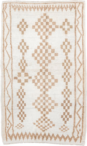 4' x 8' one-of-a-kind handmade vintage Moroccan medium size rug. Color palette: ivory, camel, cream, tan, beige