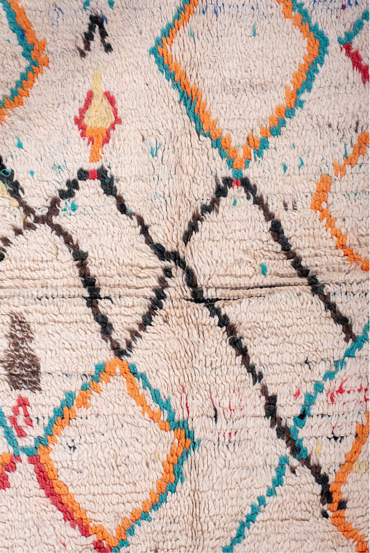 4' x 6' one-of-a-kind handmade vintage Moroccan small size rug. Color palette: black, blue, brown, gray, green