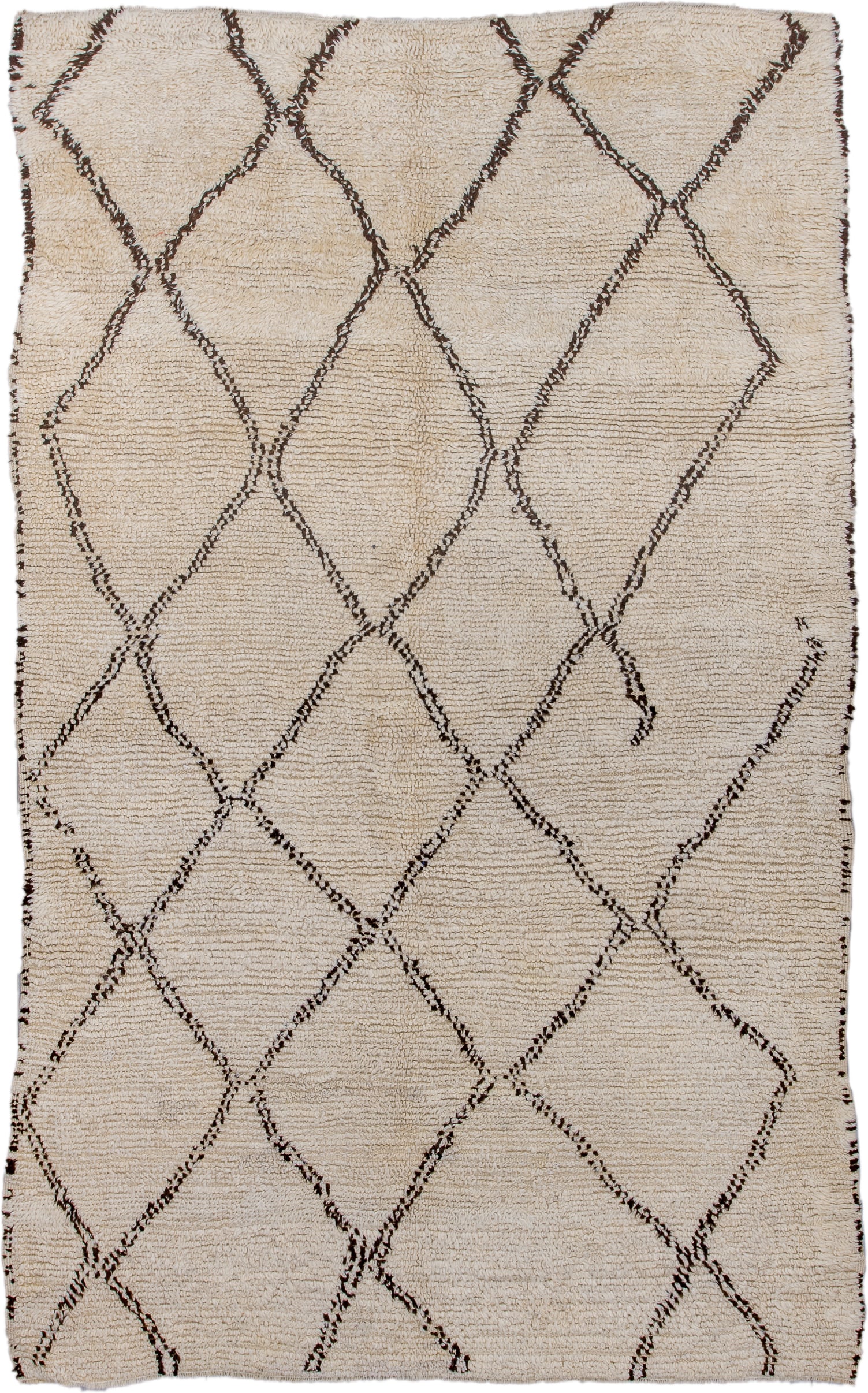 5' x 9' one-of-a-kind handmade antique Moroccan medium size rug. Color palette: ivory, brown, cream