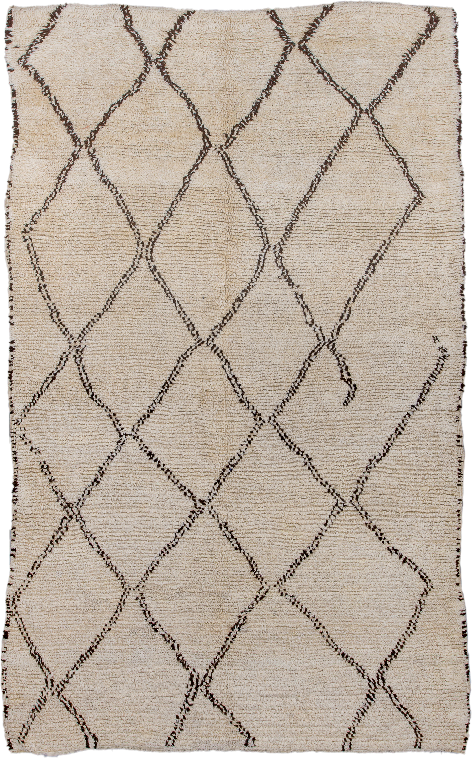 5' x 9' one-of-a-kind handmade antique Moroccan medium size rug. Color palette: ivory, brown, cream
