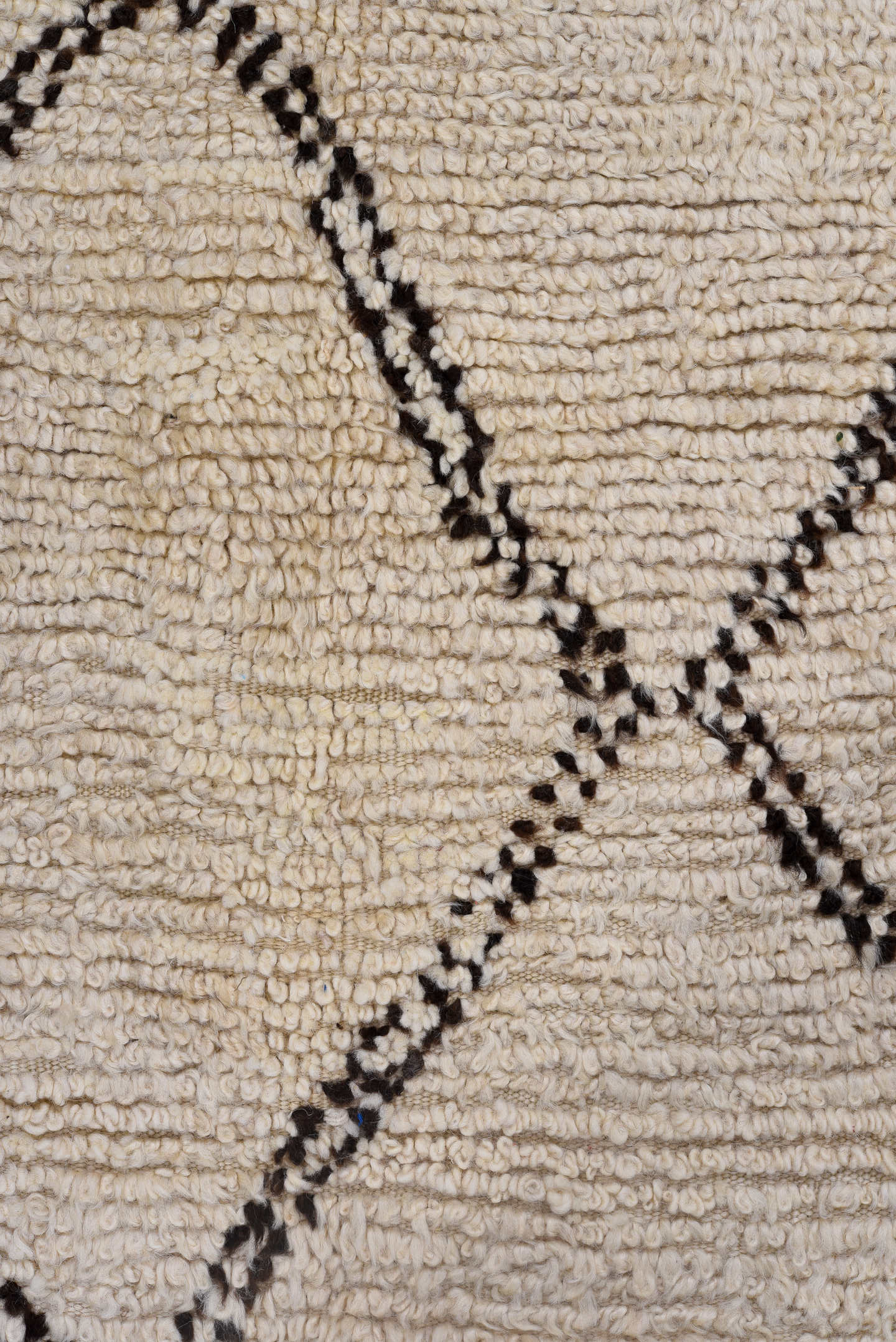 5' x 9' one-of-a-kind handmade antique Moroccan medium size rug. Color palette: ivory, brown, cream