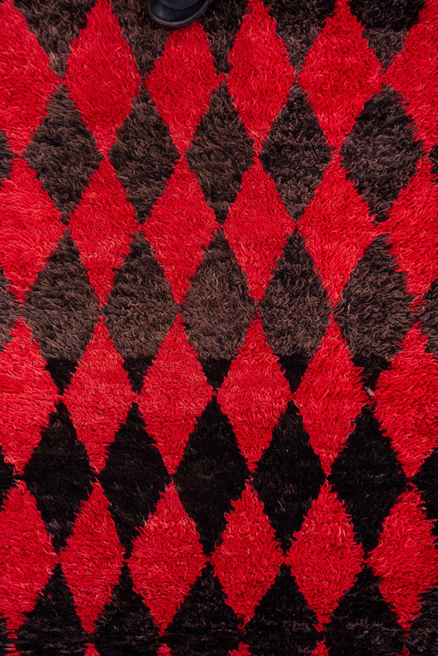 3' x 11' one-of-a-kind handmade vintage Moroccan runner rug. Color palette: crimson, charcoal, rose, red, gray, black, pink