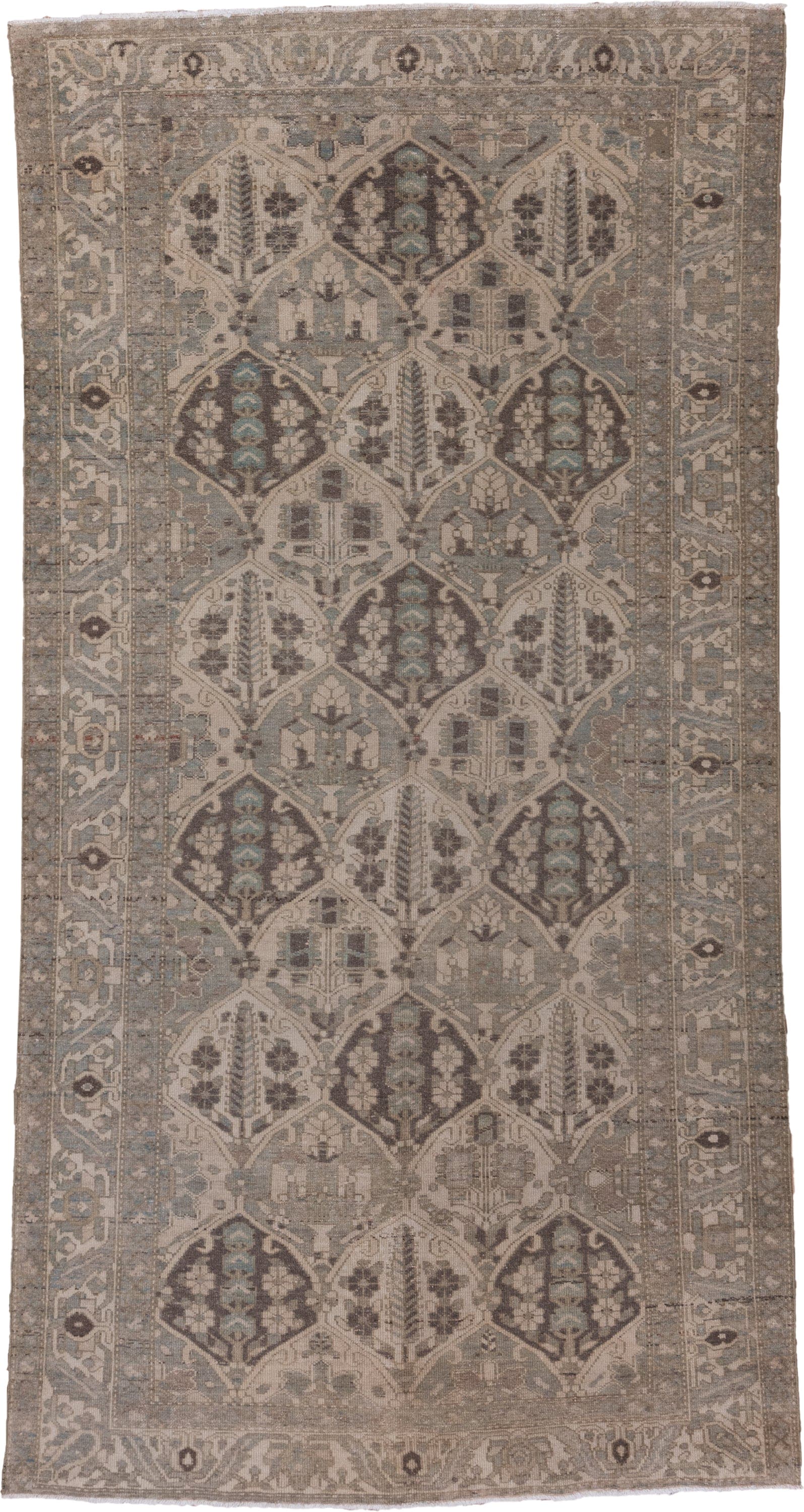 5' x 9' one-of-a-kind handmade antique Baktiary medium size rug. Color palette: taupe, ivory, slate, charcoal, camel