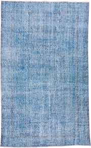 5' x 9' one-of-a-kind handmade antique Overdyed medium size rug. Color palette: sky blue, powder blue, ice blue, slate