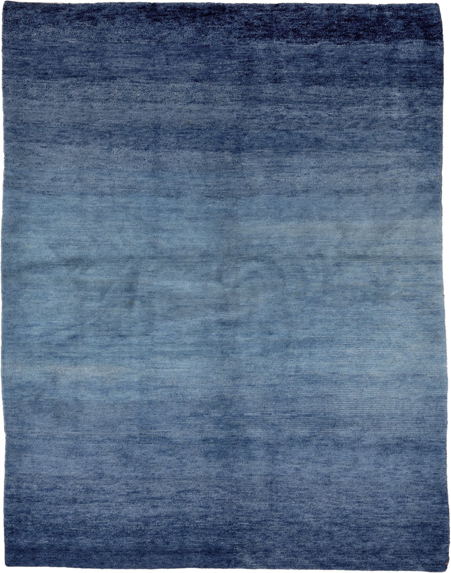 5' x 6' one-of-a-kind handmade vintage Tibetan rug. Color palette: blue, navy, slate, sky blue, gray, light blue