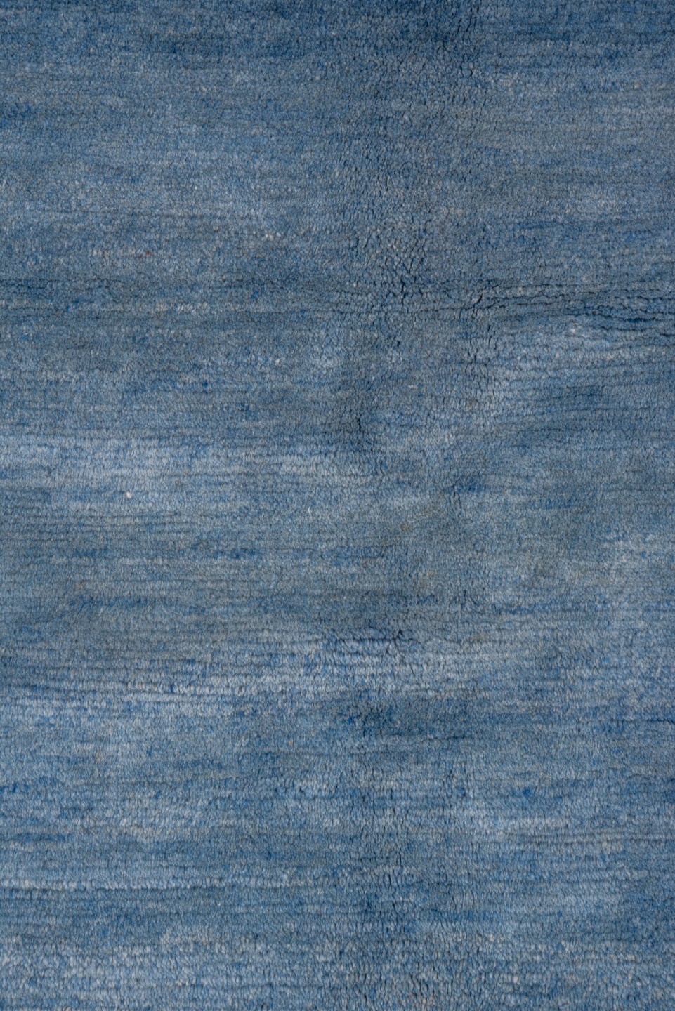 5' x 6' one-of-a-kind handmade vintage Tibetan rug. Color palette: blue, navy, slate, sky blue, gray, light blue