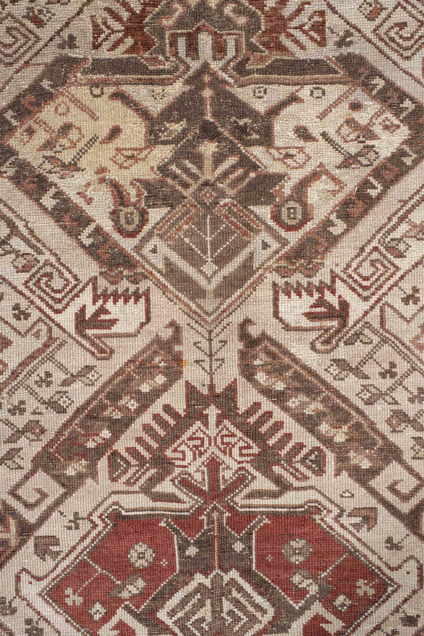 5' x 10' one-of-a-kind handmade vintage Caucasian medium size rug. Color palette: ivory, taupe, brown, rust, camel, rose