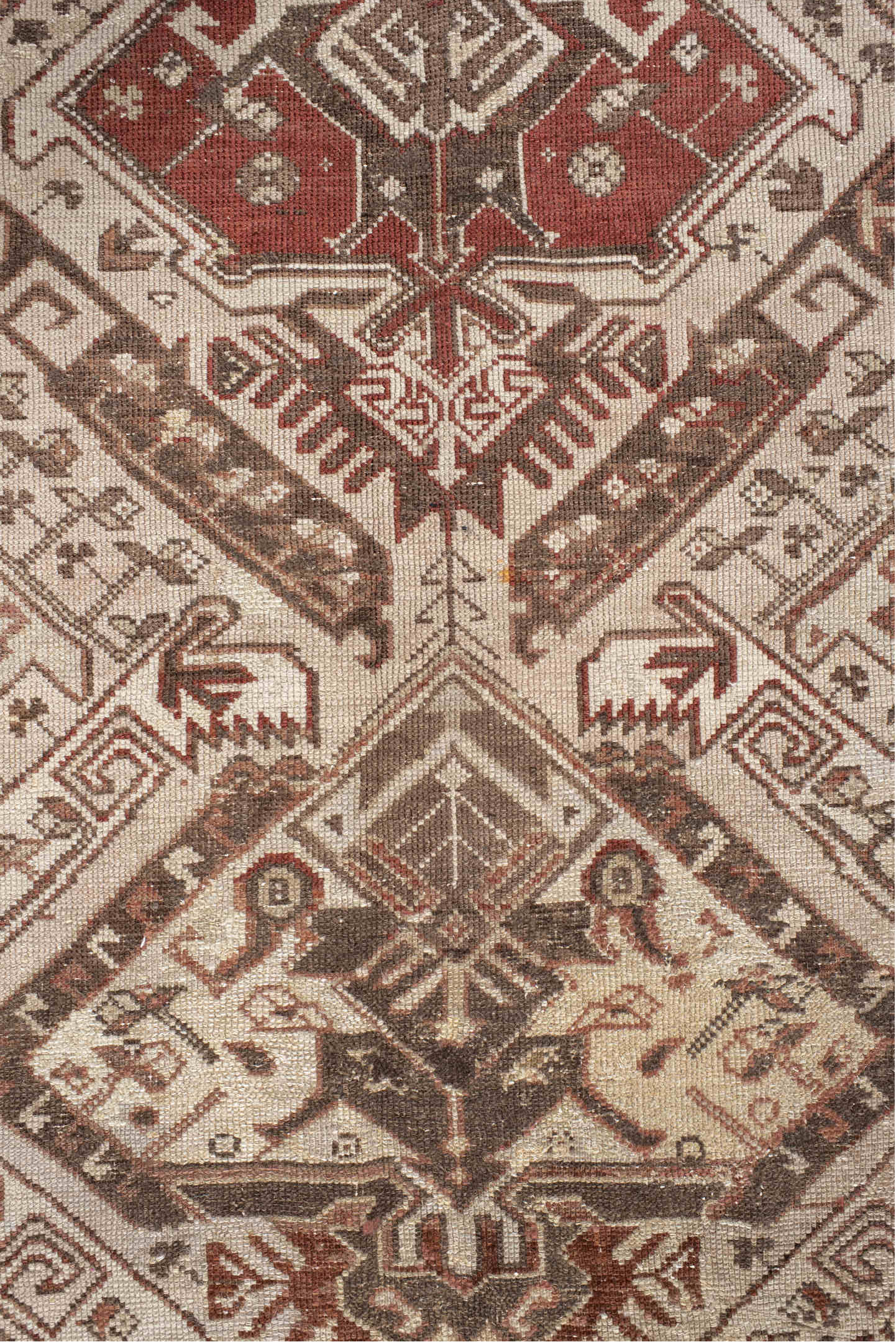 5' x 10' one-of-a-kind handmade vintage Caucasian medium size rug. Color palette: brown, gray, light gray, off-white, orange