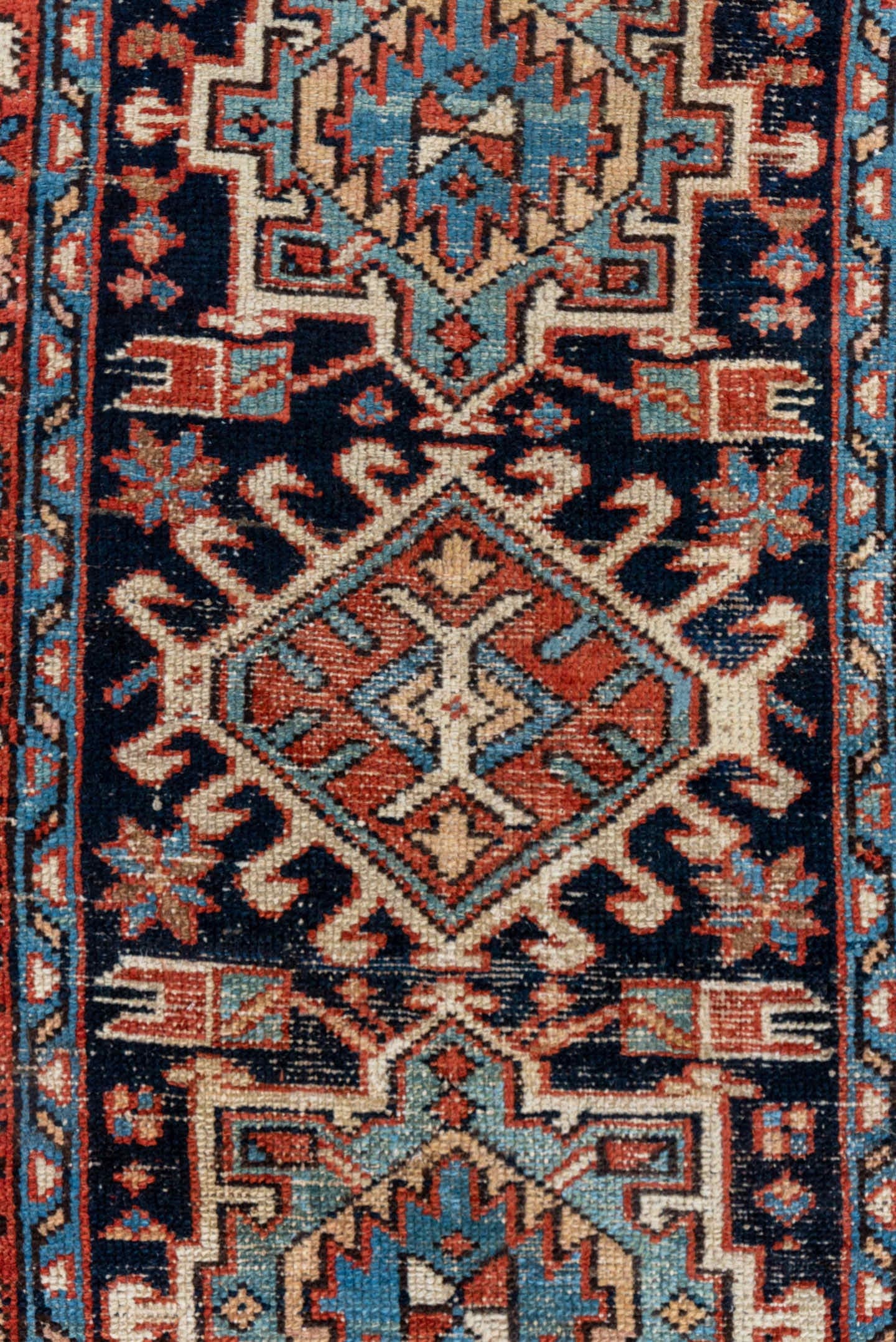 2' x 4' one-of-a-kind handmade antique Karaje small size rug. Color palette: rust, navy, ivory, sky_blue, camel, slate