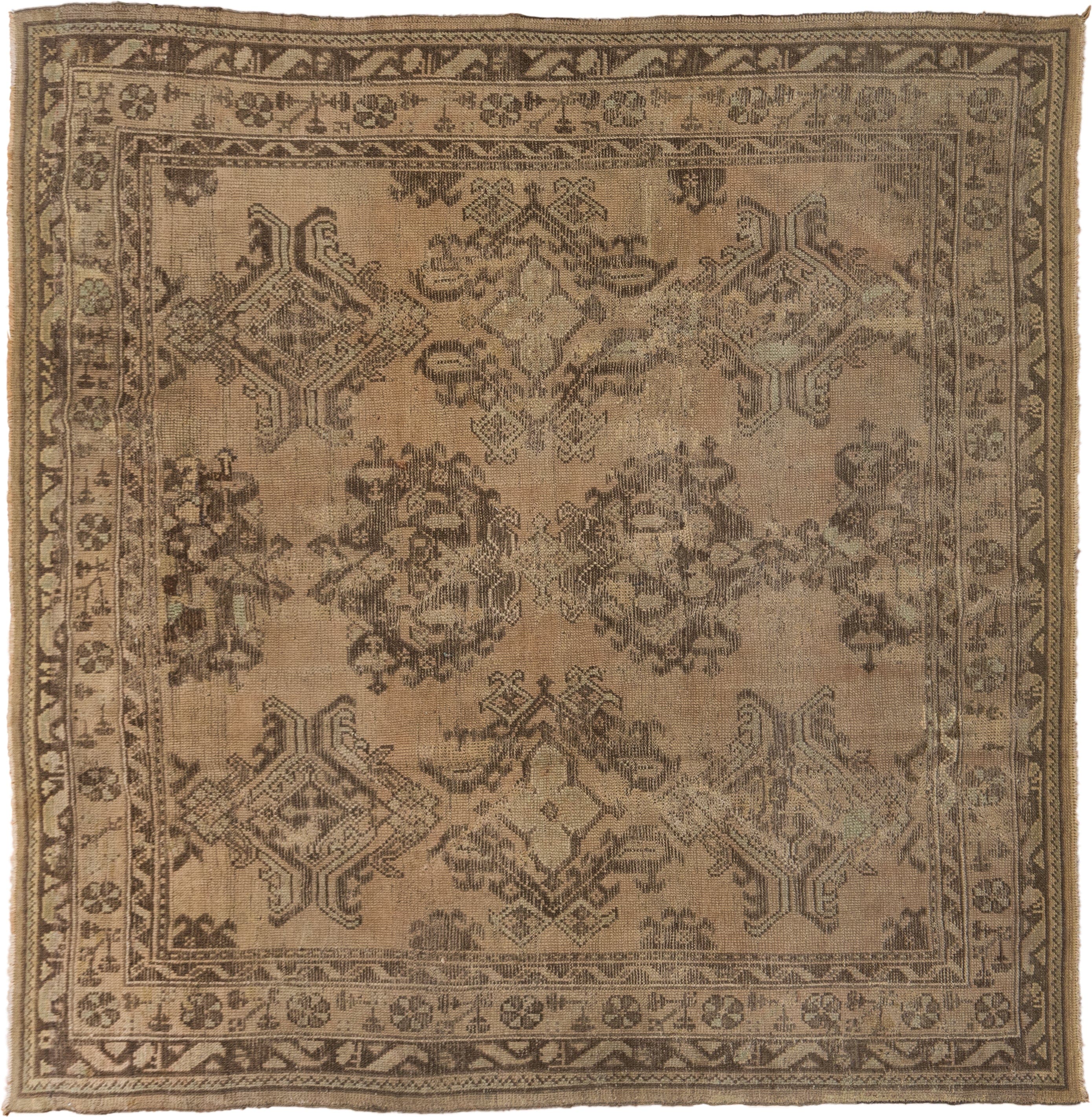 8' x 8' one-of-a-kind handmade antique Oushak rug. Color palette: taupe, brown, camel, ivory, sage, beige, gray, green