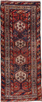 3' x 9' one-of-a-kind handmade antique NW Persian runner rug. Color palette: rust, indigo, ivory, navy, terra cotta, camel