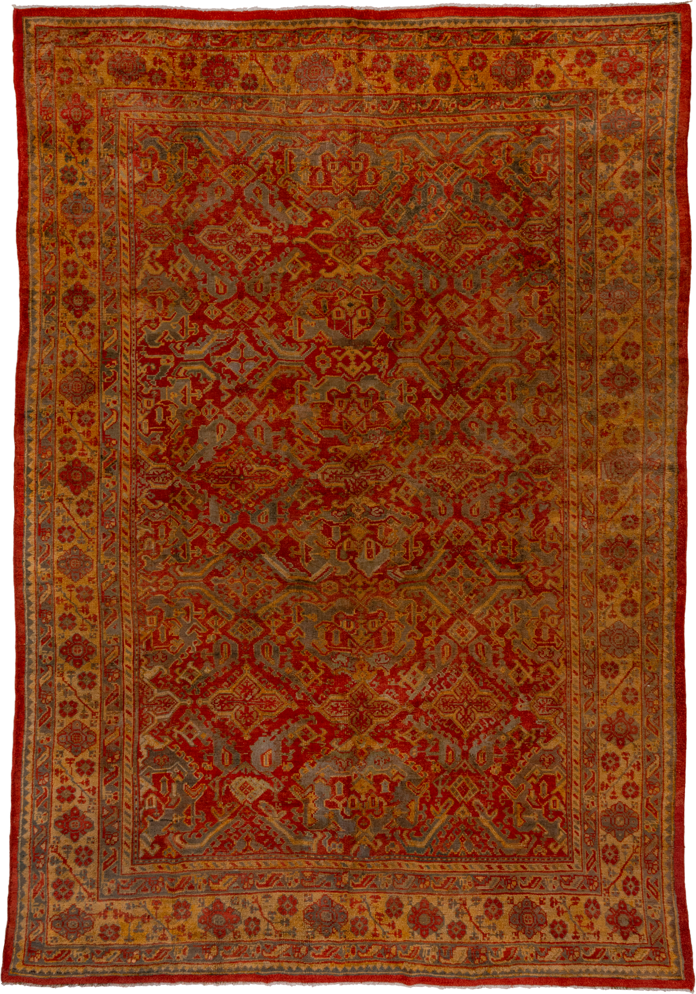 10' x 15' one-of-a-kind handmade antique Oushak rug. Color palette: rust, gold, terra cotta, slate, camel, sienna