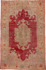 10' x 15' one-of-a-kind handmade antique Oushak rug. Color palette: rose, ivory, coral, gold, beige, saffron, pink, red