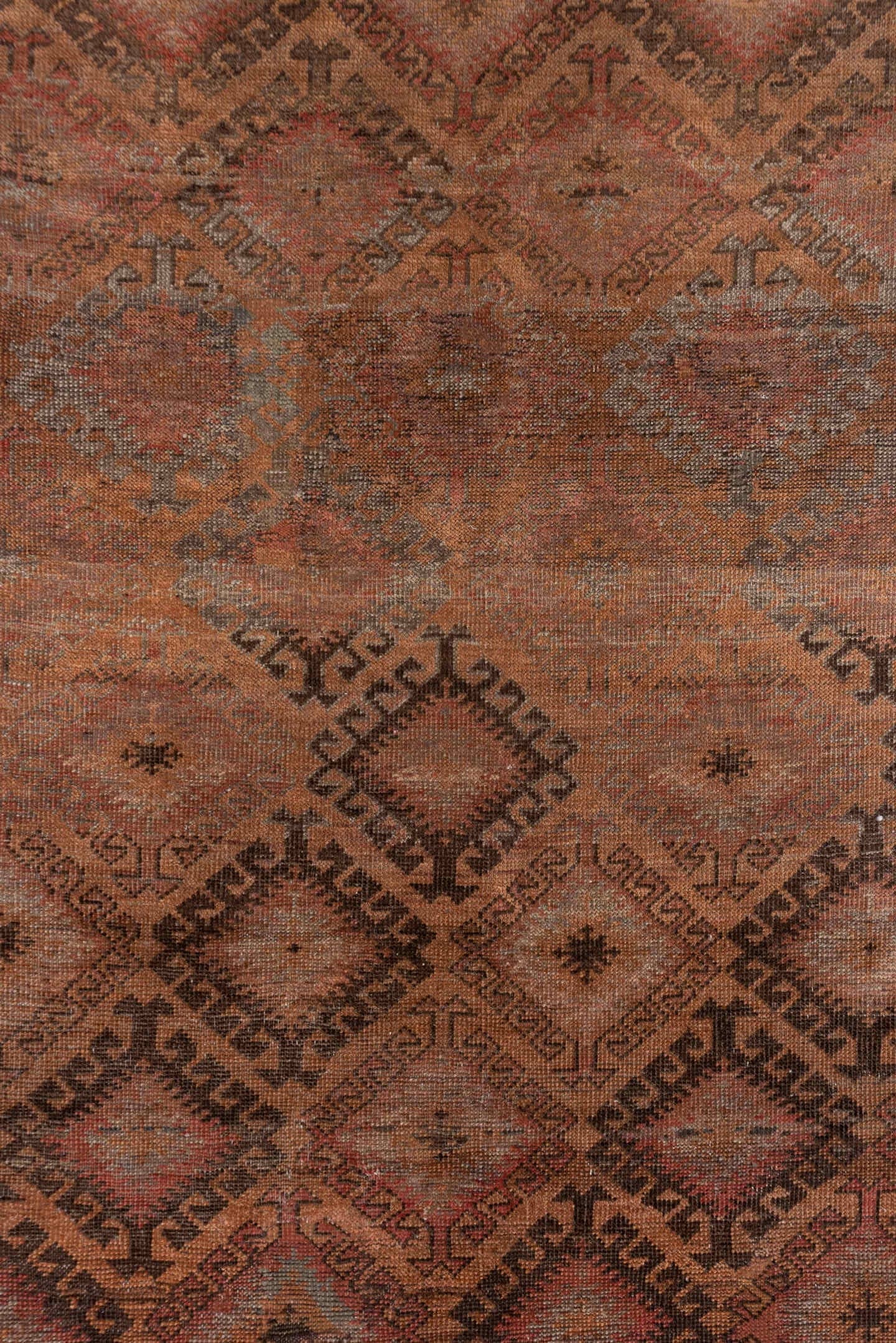 6' x 12' one-of-a-kind handmade antique Belouch large size rug. Color palette: rust, brown, charcoal, taupe, rose, slate