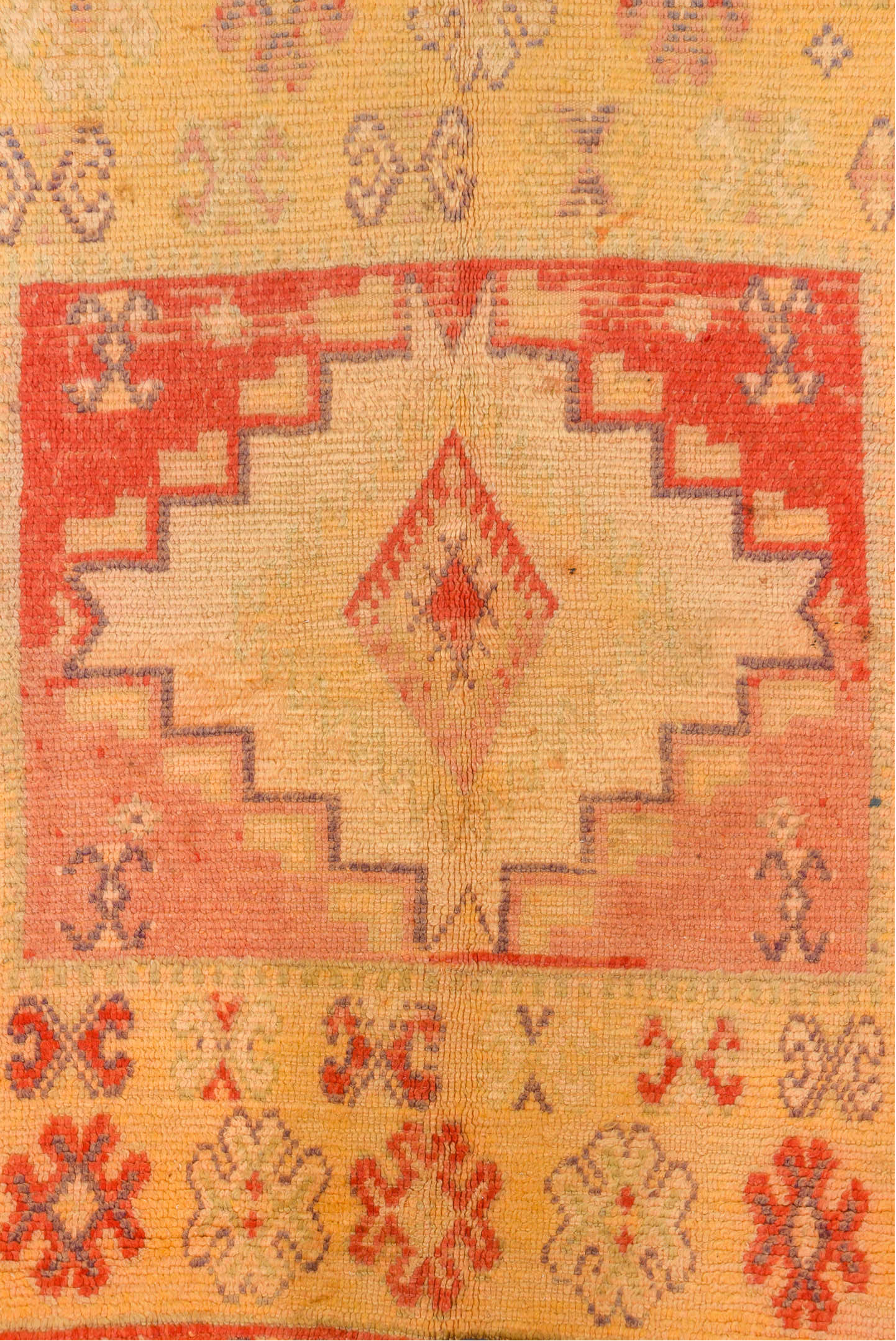 5' x 9' one-of-a-kind handmade vintage Moroccan medium size rug. Color palette: brown, off-white, orange, pink, red