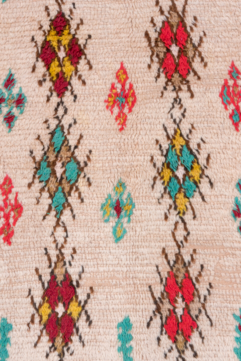 3' x 7' one-of-a-kind handmade vintage Moroccan rug. Color palette: ivory, crimson, turquoise, brown, gold, taupe, red, teal