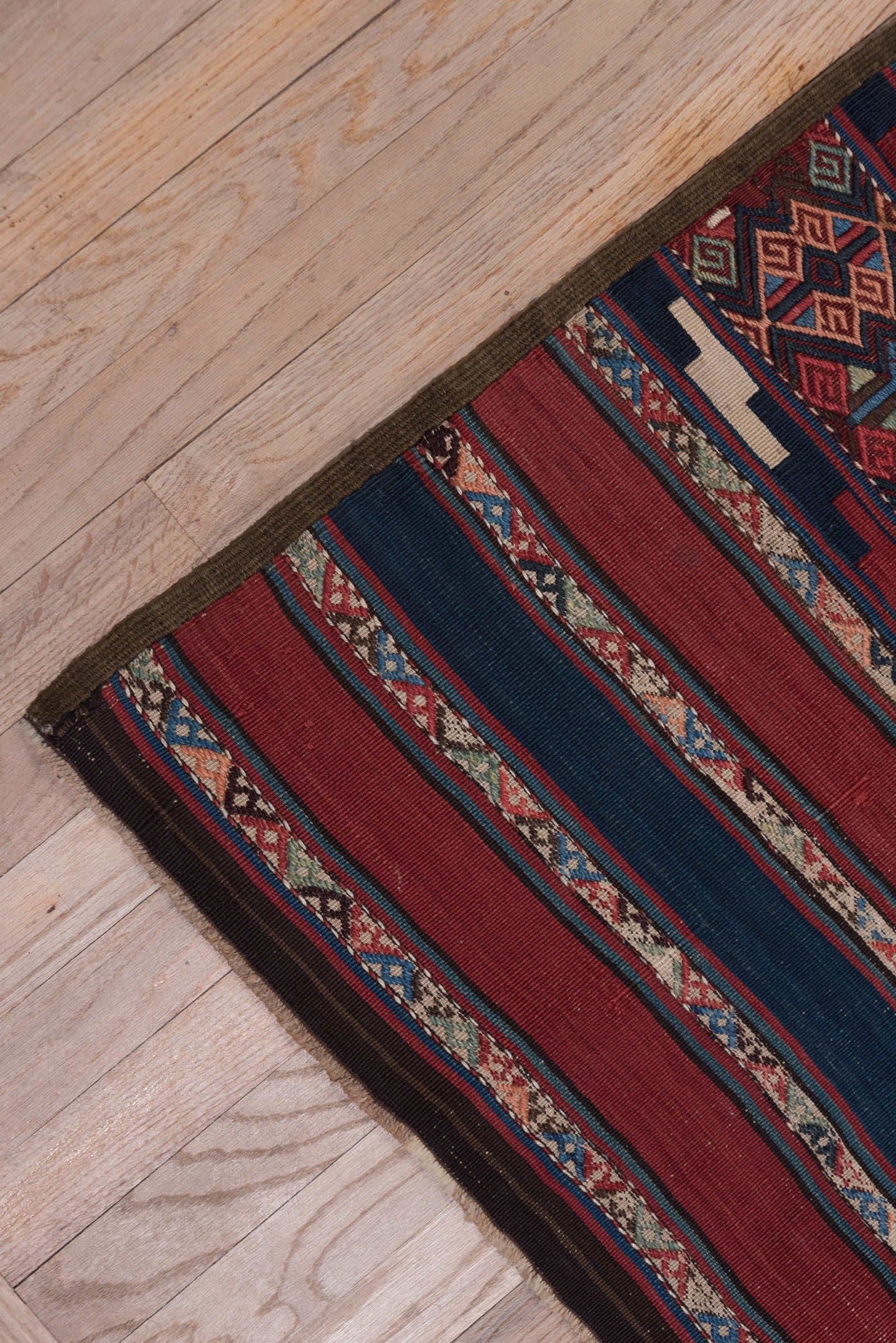 5' x 15' one-of-a-kind handmade antique Kilim rug. Color palette: rust, indigo, burgundy, ivory, navy, sienna, camel