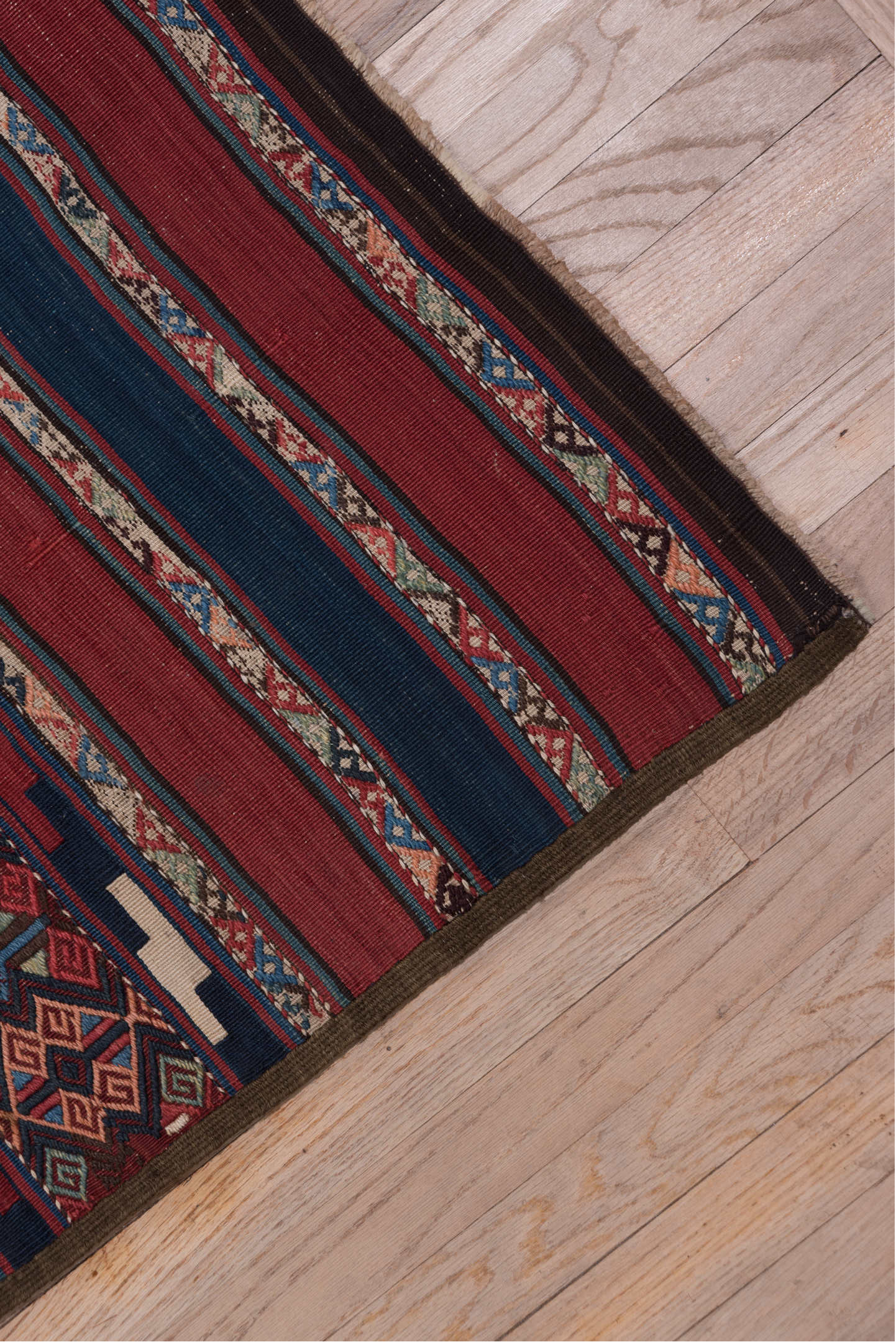 5' x 15' one-of-a-kind handmade antique Kilim rug. Color palette: rust, indigo, burgundy, ivory, navy, sienna, camel
