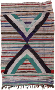 5' x 8' one-of-a-kind handmade vintage Rag Rug medium size rug. Color palette: ivory, black, teal, red, sky_blue, violet