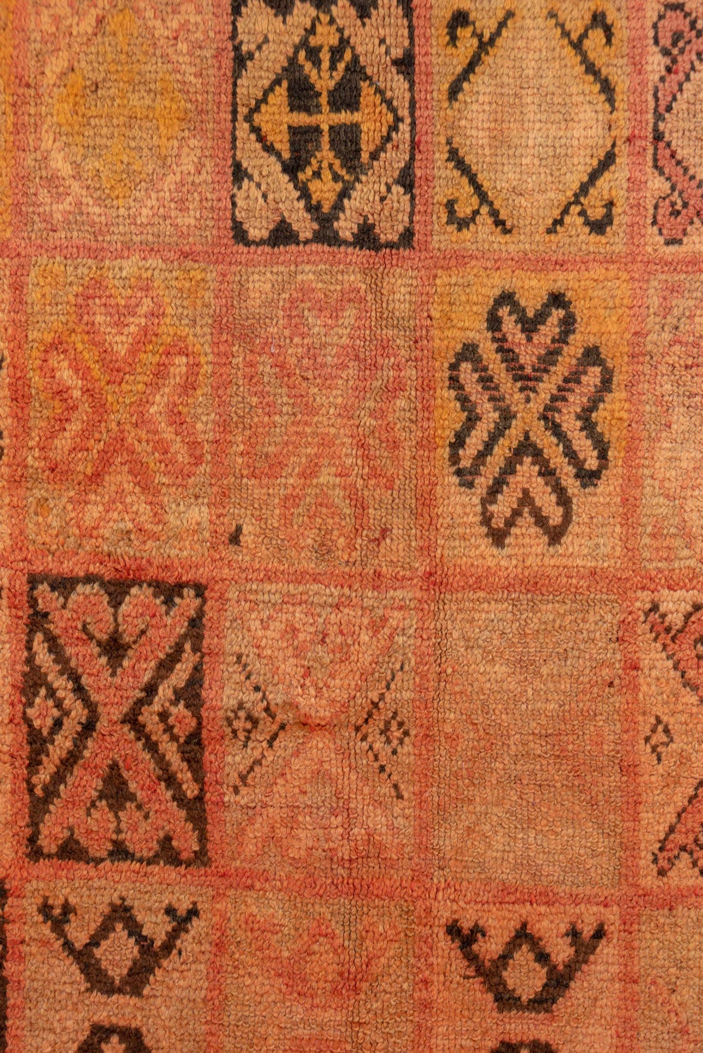 4' x 7' one-of-a-kind handmade vintage Moroccan rug. Color palette: salmon, terra cotta, peach, coral, charcoal, rose