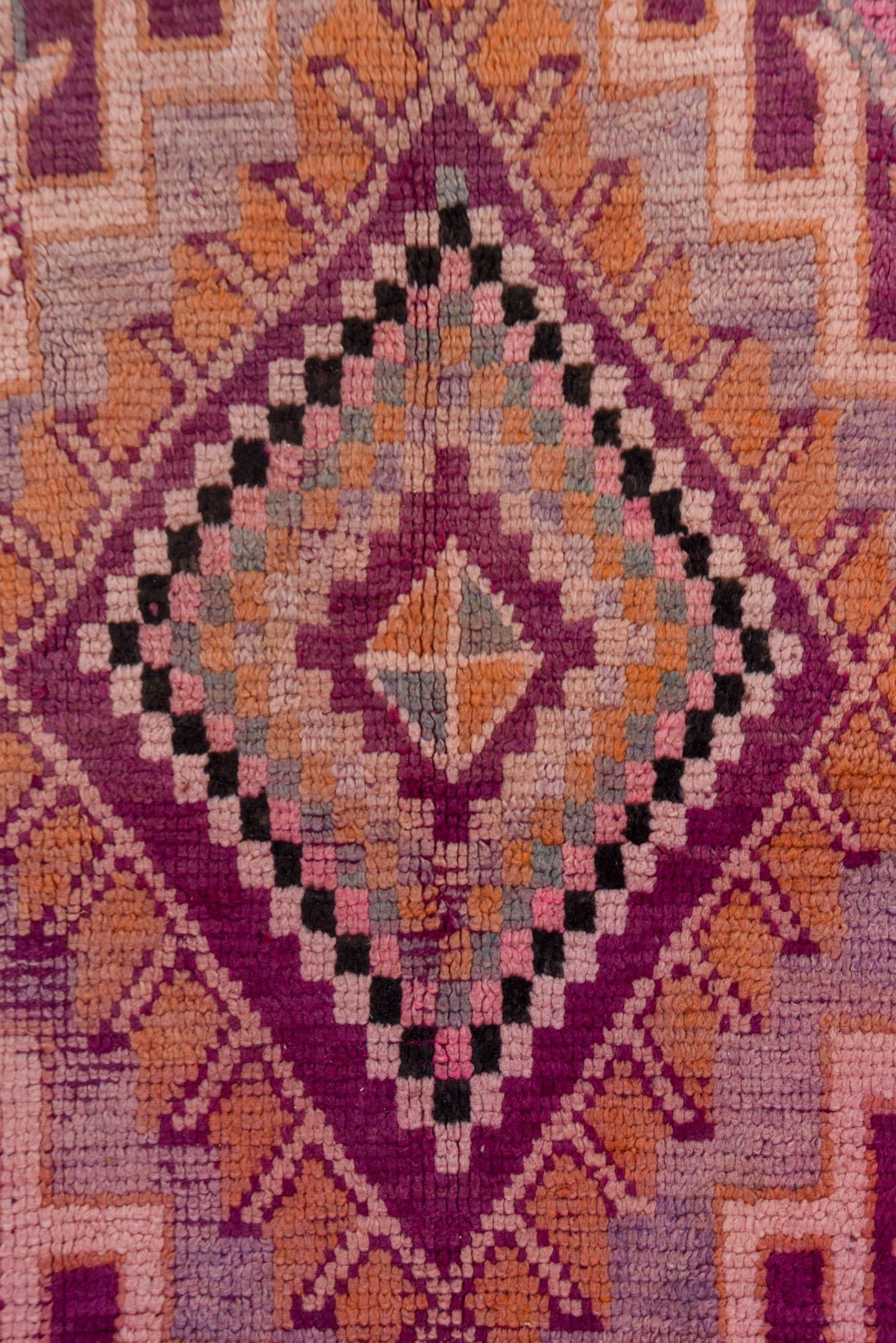 5' x 8' one-of-a-kind handmade vintage Moroccan medium size rug. Color palette: magenta, rose, mauve, peach, plum, lavender