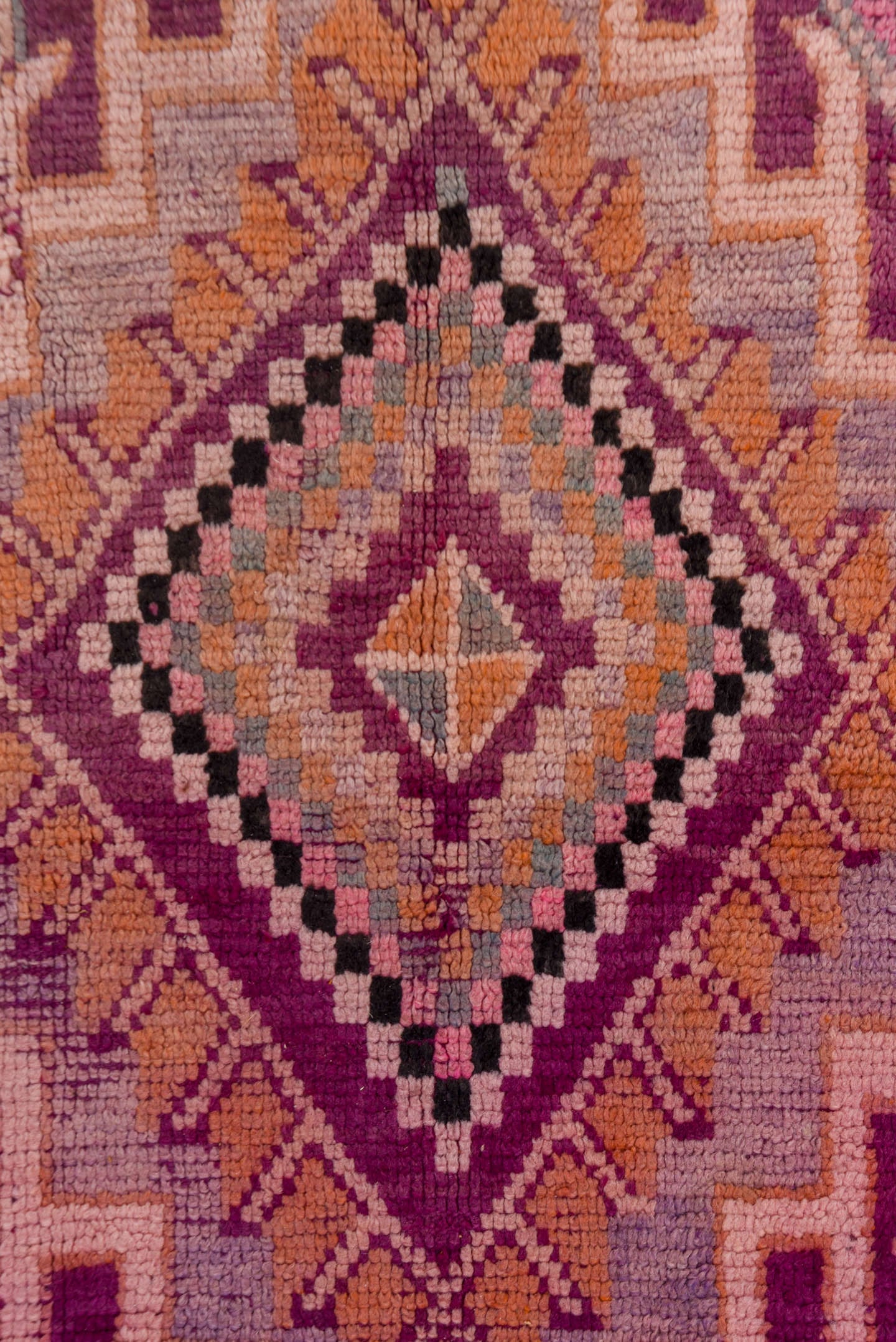 5' x 8' one-of-a-kind handmade vintage Moroccan medium size rug. Color palette: magenta, rose, mauve, peach, plum, lavender