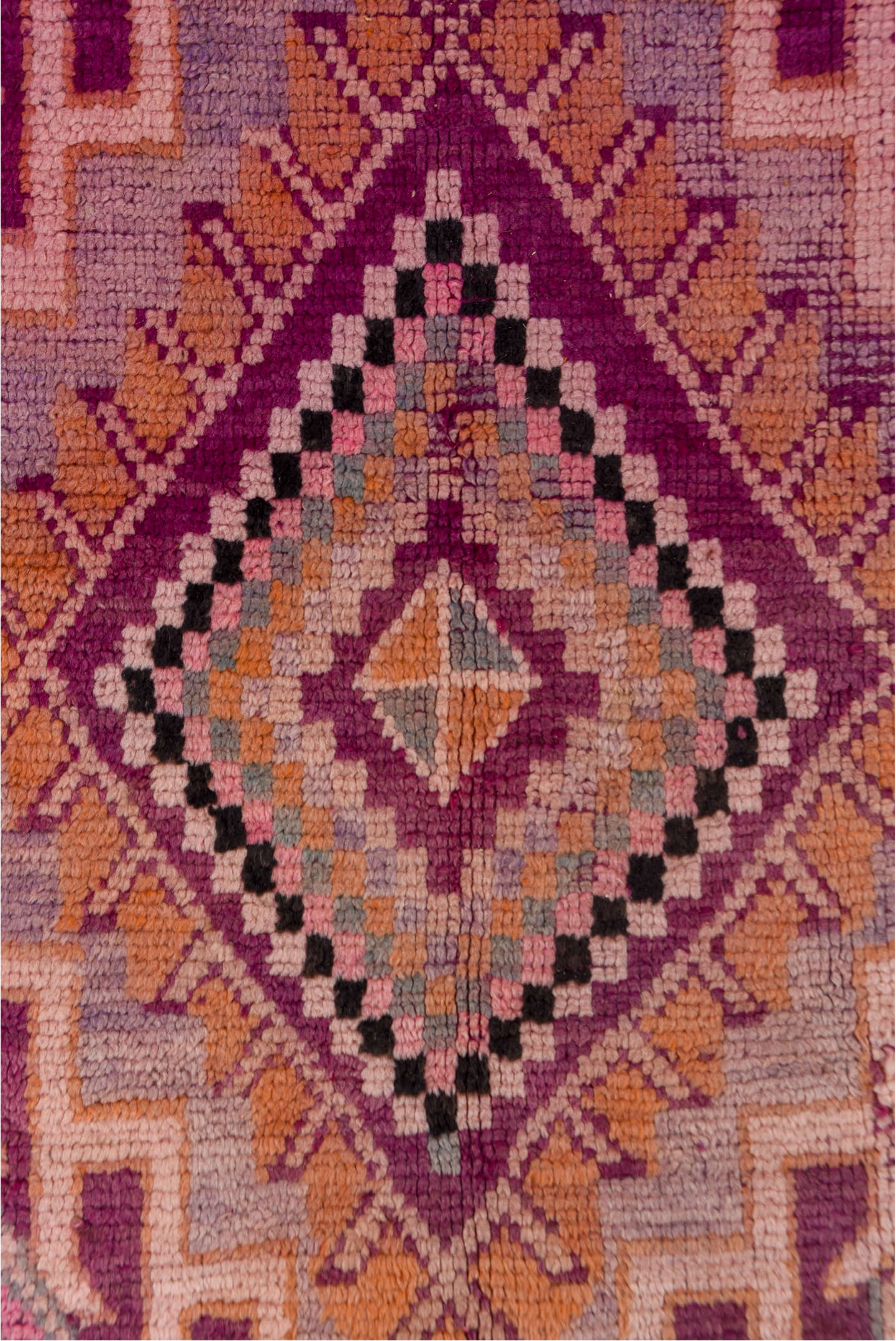 5' x 8' one-of-a-kind handmade vintage Moroccan medium size rug. Color palette: brown, gray, pink, red, rosy brown
