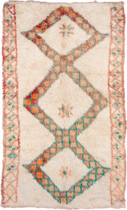 5' x 9' one-of-a-kind handmade vintage Moroccan medium size rug. Color palette: ivory, peach, teal, coral, orange, red