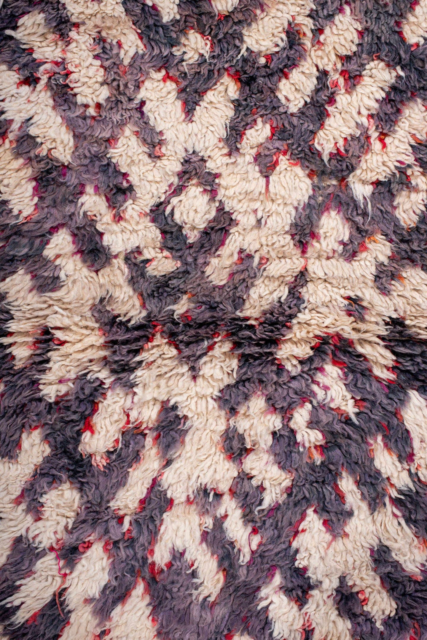 3' x 5' one-of-a-kind handmade vintage Moroccan small size rug. Color palette: ivory, plum, charcoal, crimson, rose, pink
