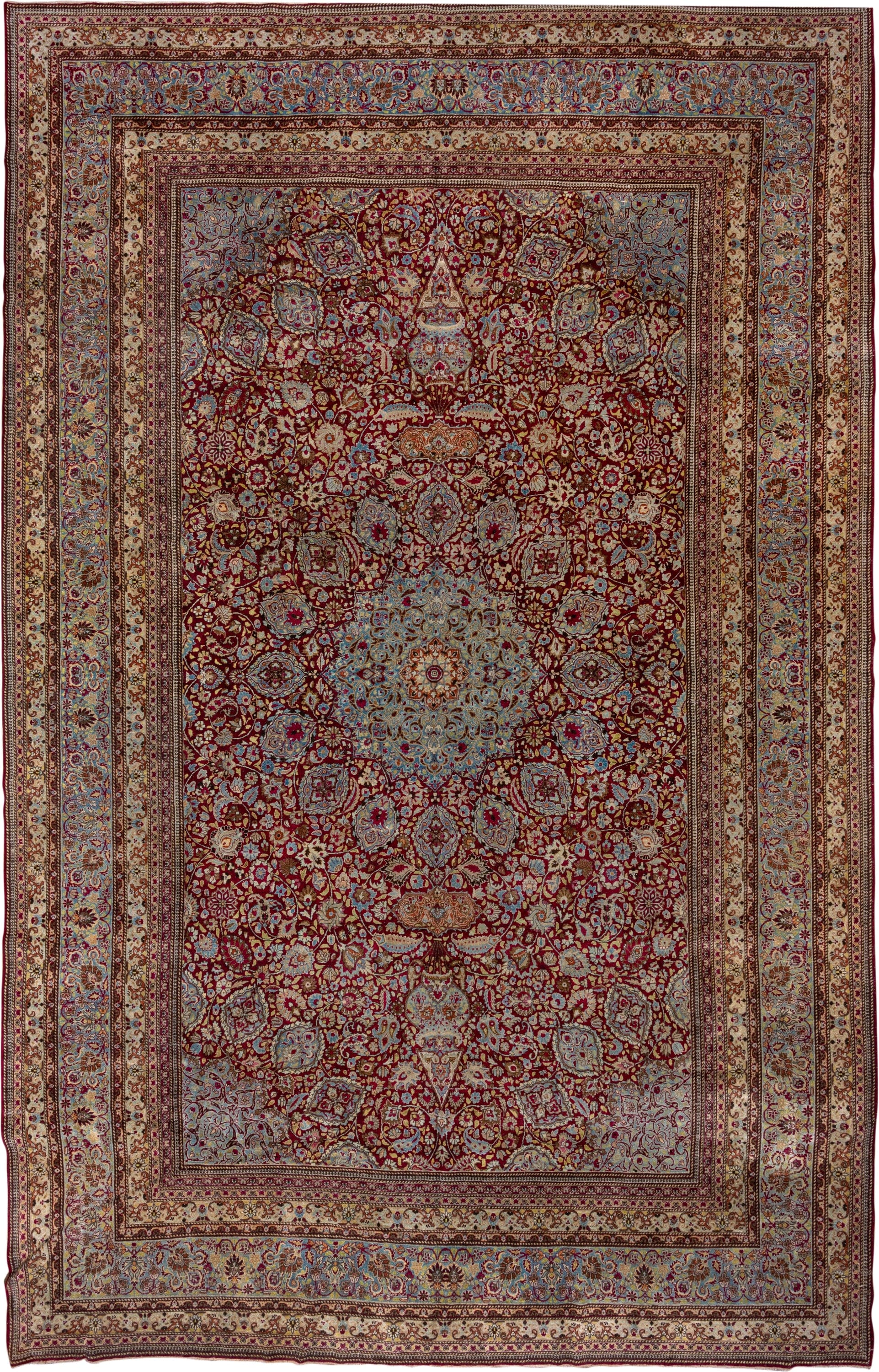 11' x 17' one-of-a-kind handmade antique Kerman oversize rug. Color palette: burgundy, sky blue, ivory, gold, rose, camel