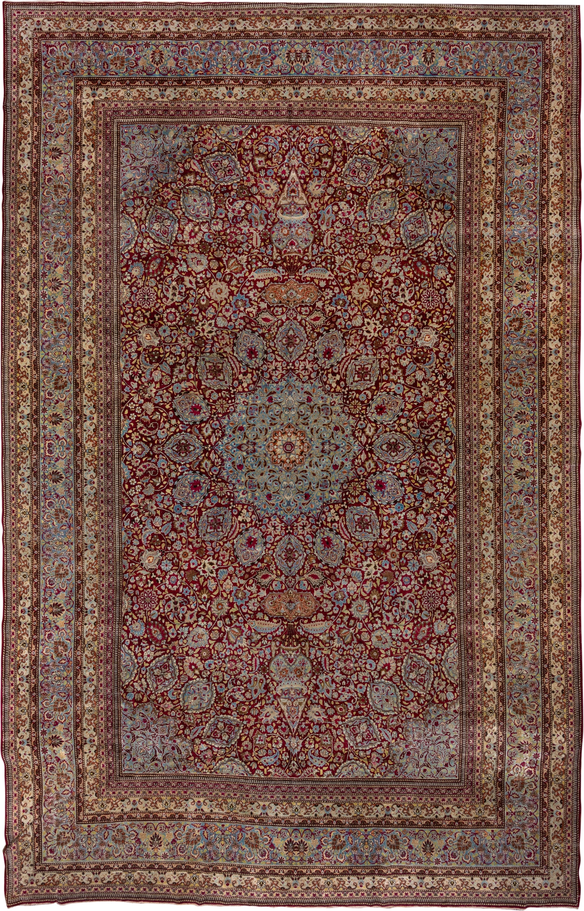 11' x 17' one-of-a-kind handmade antique Kerman oversize rug. Color palette: burgundy, sky blue, ivory, gold, rose, camel
