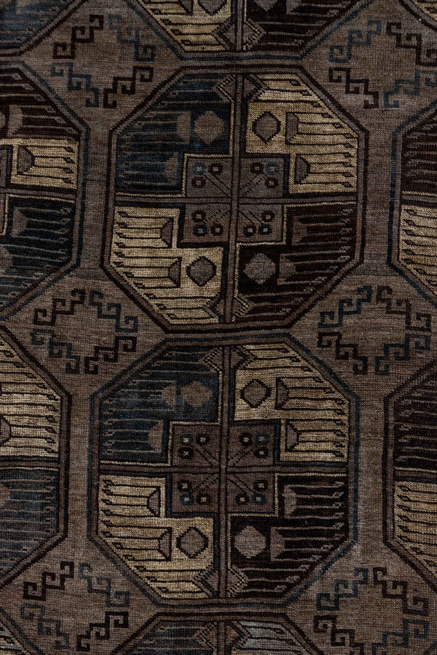 7' x 10' one-of-a-kind handmade antique Afghan large size rug. Color palette: brown, taupe, camel, ebony, ivory, beige, gray