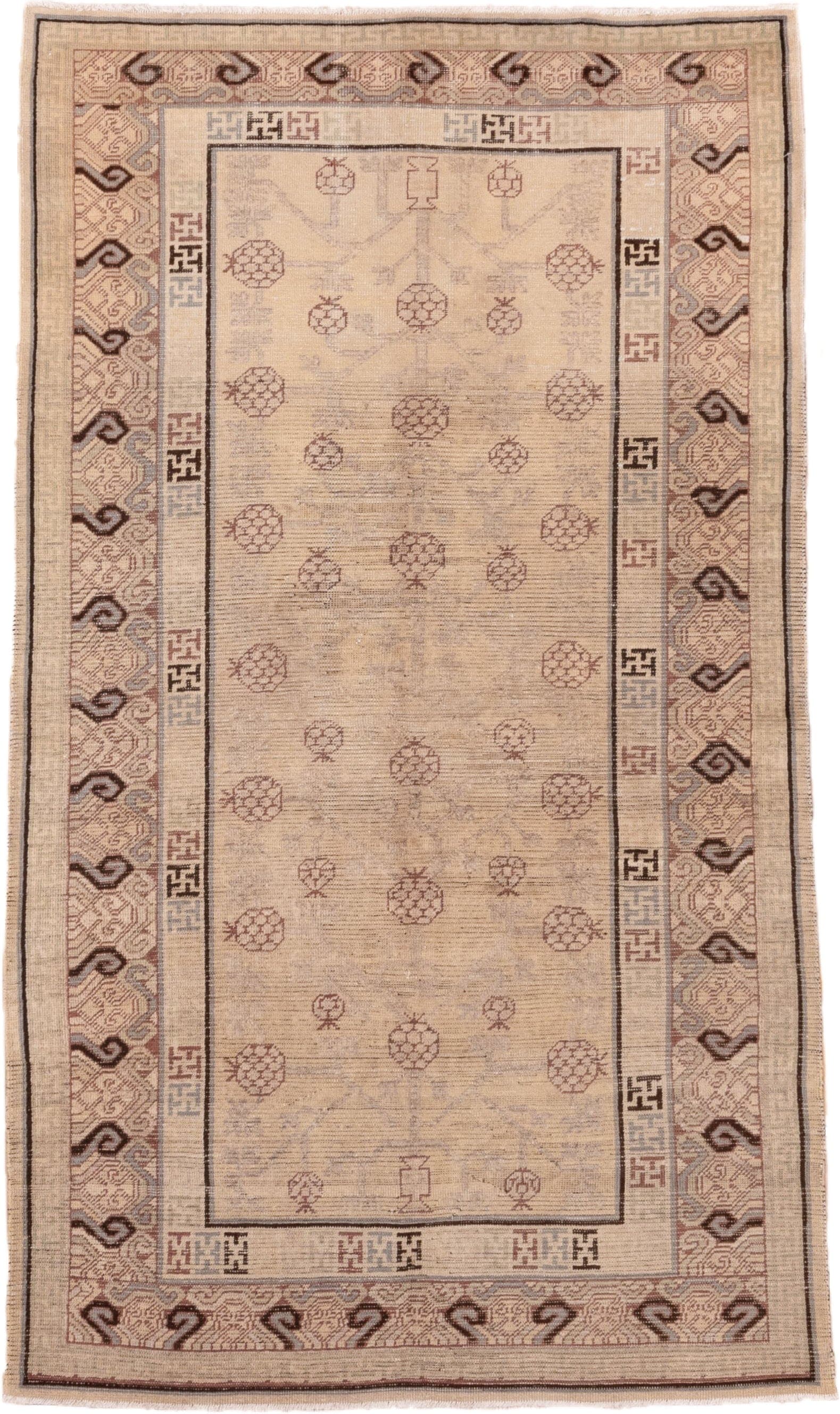 4' x 8' one-of-a-kind handmade vintage Khotan rug. Color palette: ivory, taupe, brown, camel, rose, slate, beige, gray, pink