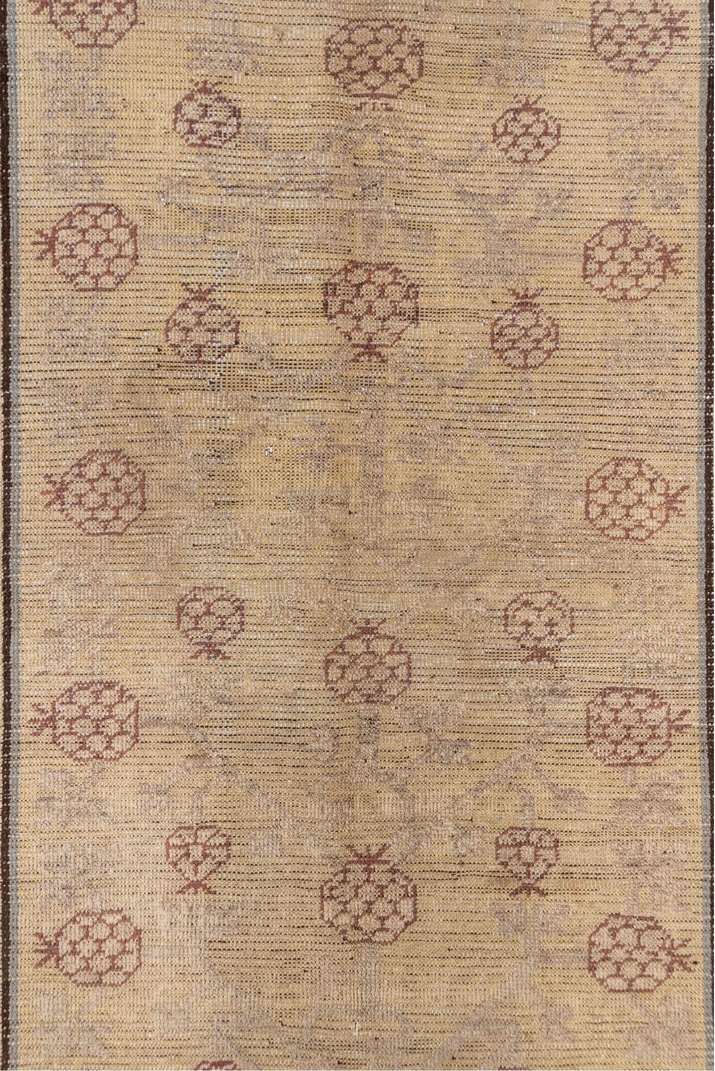 4' x 8' one-of-a-kind handmade vintage Khotan rug. Color palette: ivory, taupe, brown, camel, rose, slate, beige, gray, pink