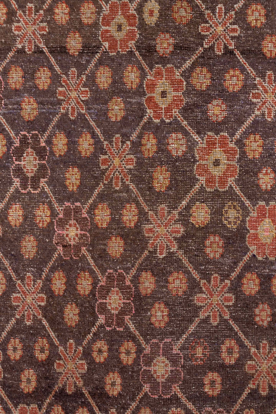 4' x 8' one-of-a-kind handmade vintage Khotan rug. Color palette: brown, rust, camel, ivory, rose, blue, charcoal