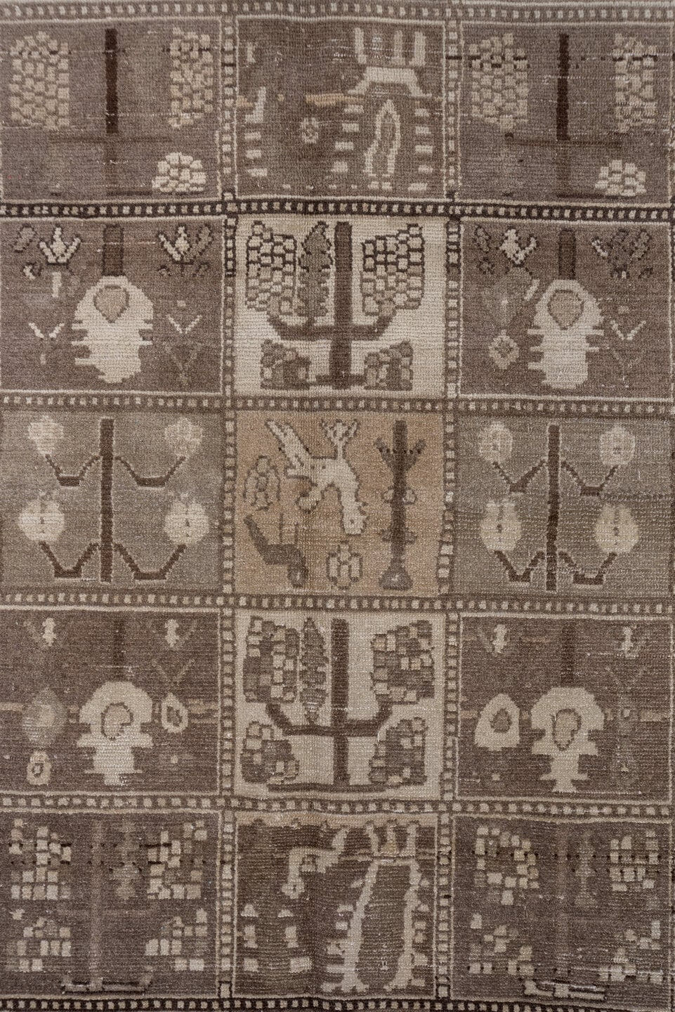 5' x 9' one-of-a-kind handmade antique Baktiary medium size rug. Color palette: taupe, brown, ivory, charcoal, camel, beige
